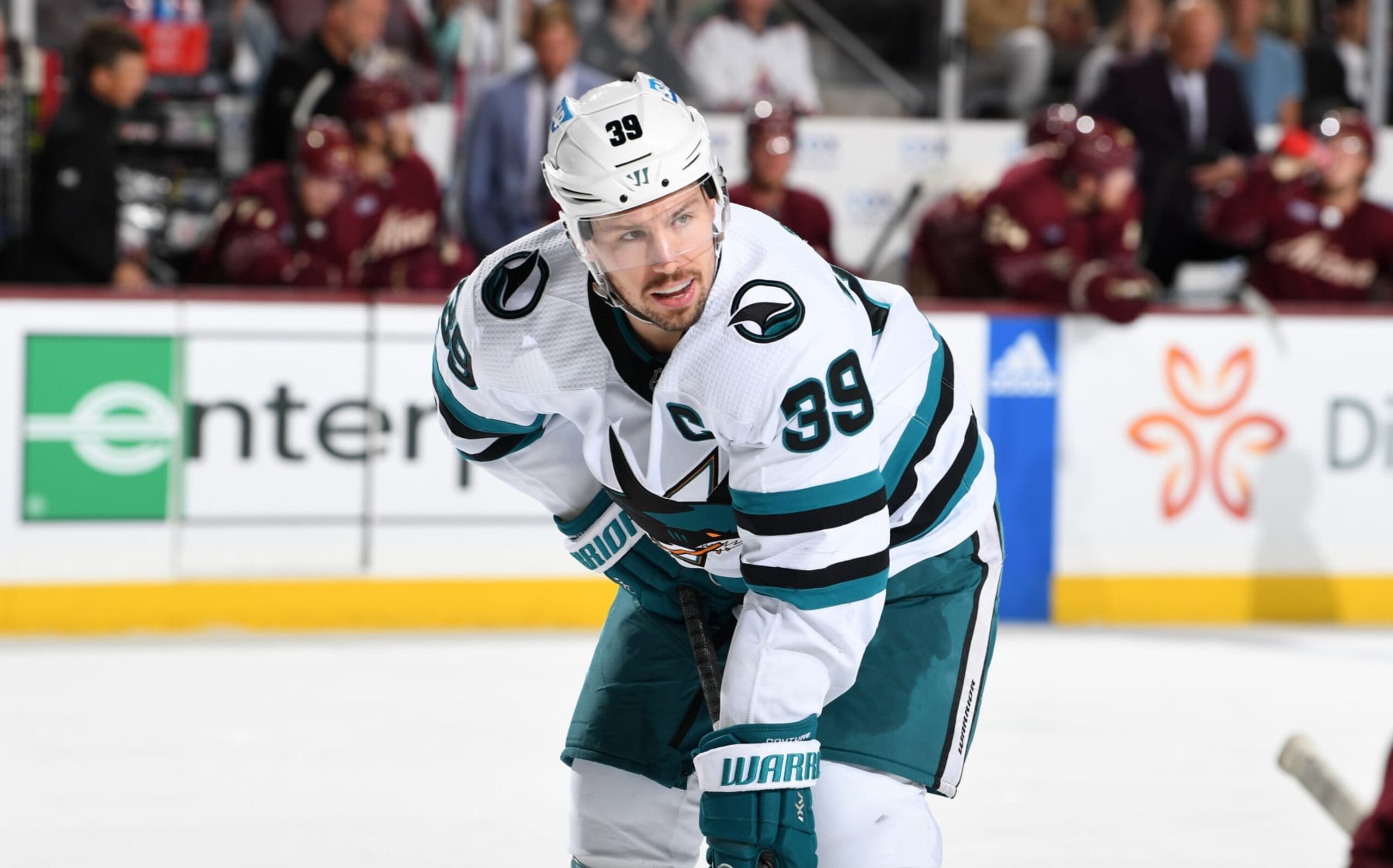 TEMPE, ARIZONA - APRIL 01: Logan Couture #39 of the San Jose Sharks gets ready during a face off against the Arizona Coyotes at Mullett Arena on April 01, 2023 in Tempe, Arizona. (Photo by Norm Hall/NHLI via Getty Images)