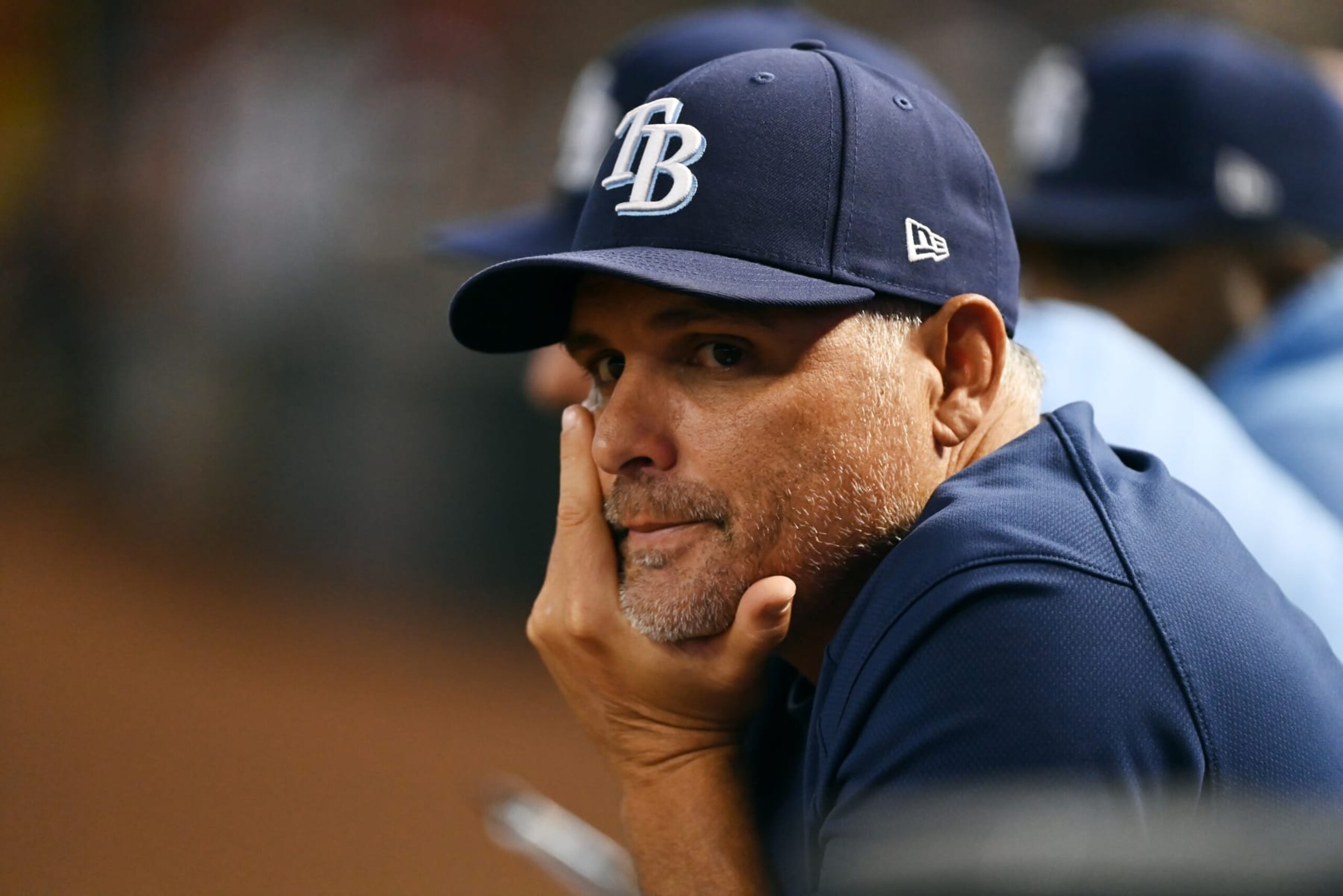 PHOENIX, ARIZONA - JUNE 27: Manager Kevin Cash #16 of the Tampa Bay Rays looks on from the dugout during the third inning against the Arizona Diamondbacks at Chase Field on June 27, 2023 in Phoenix, Arizona. (Photo by Norm Hall/Getty Images) PHOENIX, ARIZONA - JUNE 27: Manager Kevin Cash #16 of the Tampa Bay Rays looks on from the dugout during the third inning against the Arizona Diamondbacks at Chase Field on June 27, 2023 in Phoenix, Arizona. (Photo by Norm Hall/Getty Images)