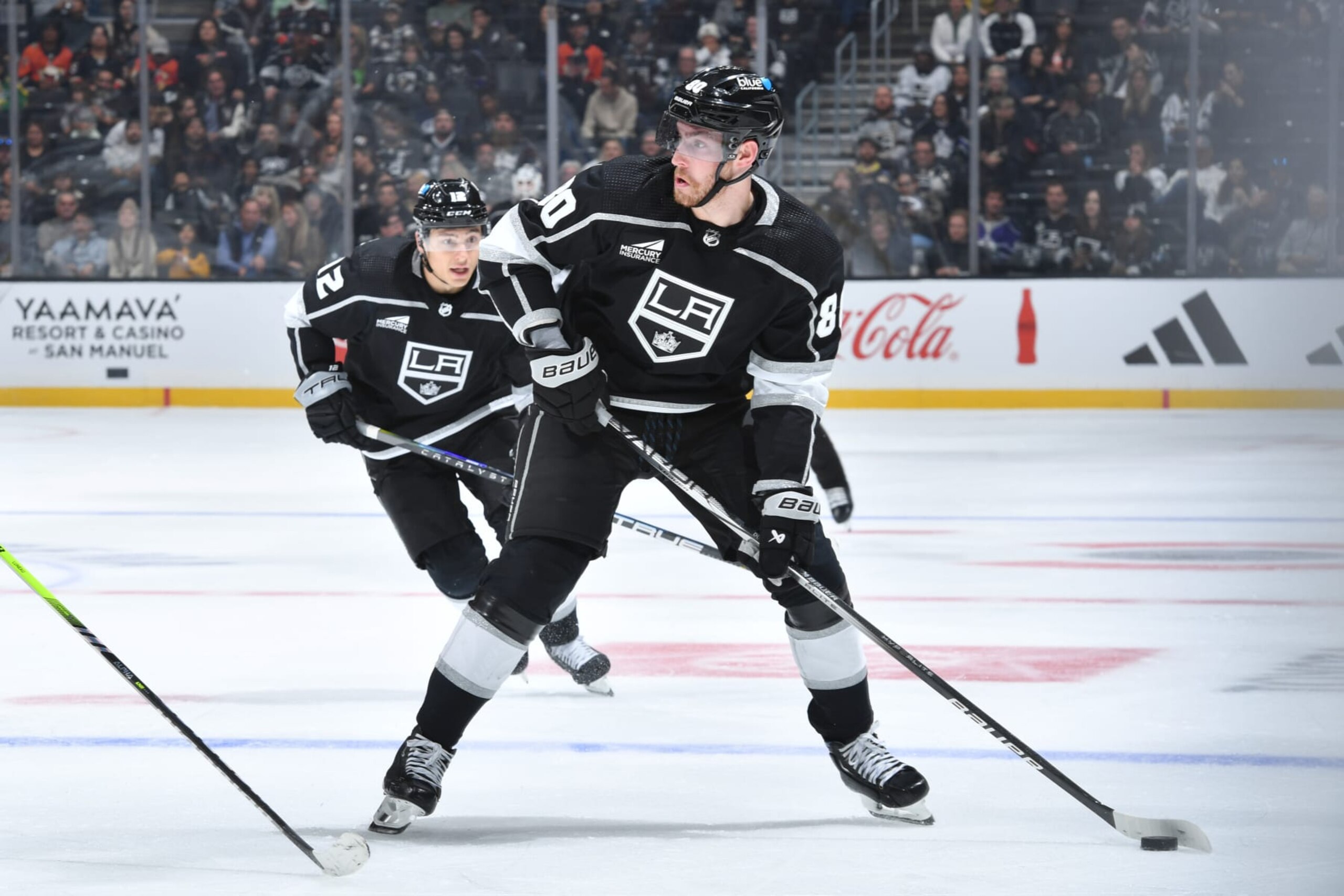 LOS ANGELES, CA - October 3: Pierre-Luc Dubois #80 of the Los Angeles Kings skates with puck during the third period against the Anaheim Ducks at Crypto.com Arena on October 3, 2023 in Los Angeles, California. (Photo by Juan Ocampo/NHLI via Getty Images)