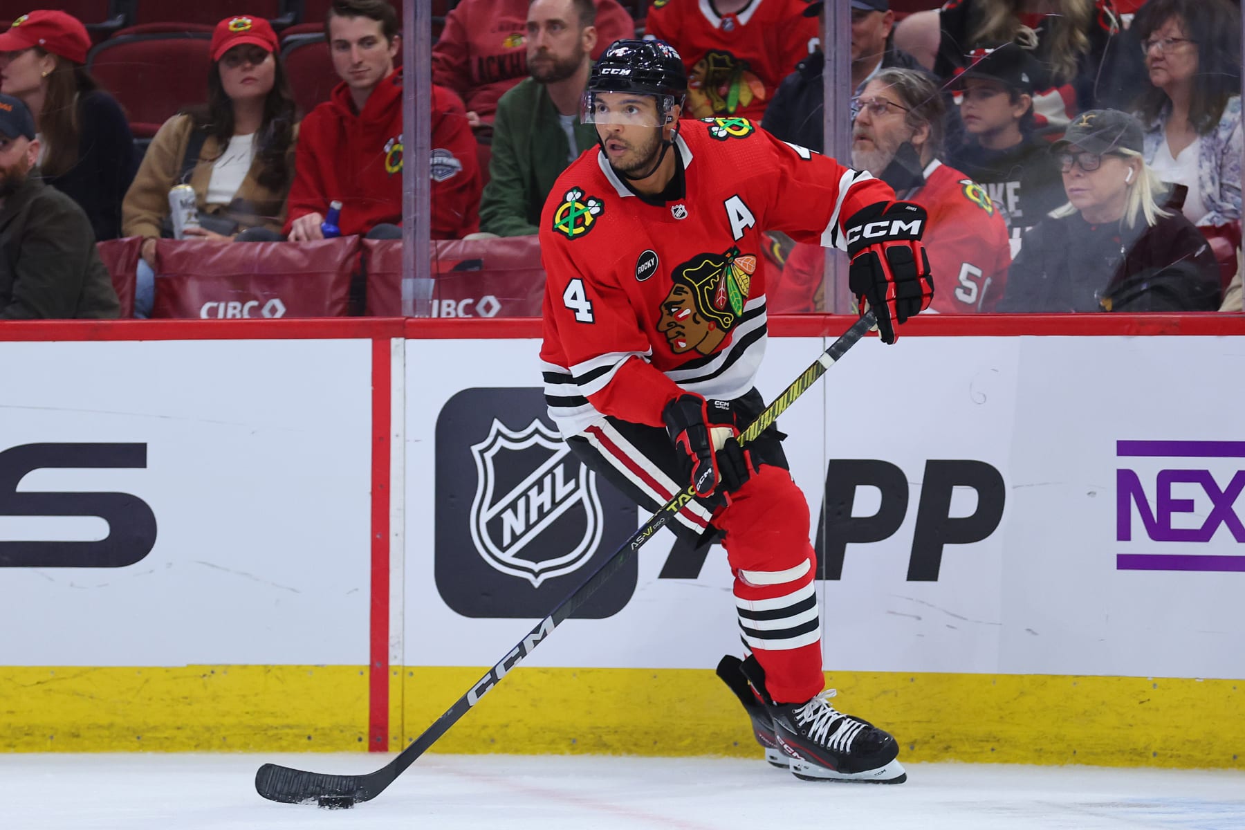 CHICAGO, ILLINOIS - SEPTEMBER 28: Seth Jones #4 of the Chicago Blackhawks skates with the puck against the St. Louis Blues during the third period of a preseason game at the United Center on September 28, 2023 in Chicago, Illinois. (Photo by Michael Reaves/Getty Images)