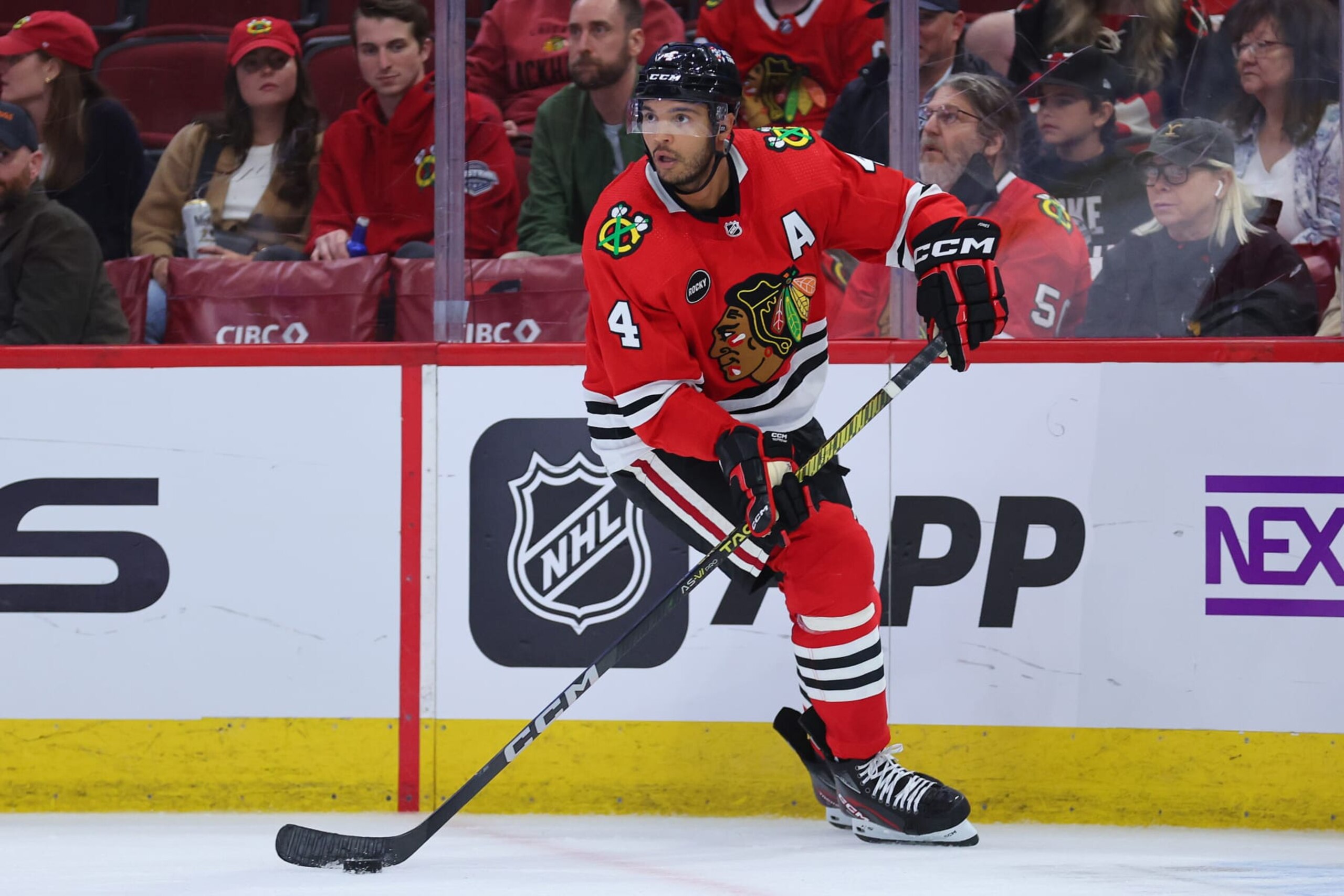 CHICAGO, ILLINOIS - SEPTEMBER 28: Seth Jones #4 of the Chicago Blackhawks skates with the puck against the St. Louis Blues during the third period of a preseason game at the United Center on September 28, 2023 in Chicago, Illinois. (Photo by Michael Reaves/Getty Images)