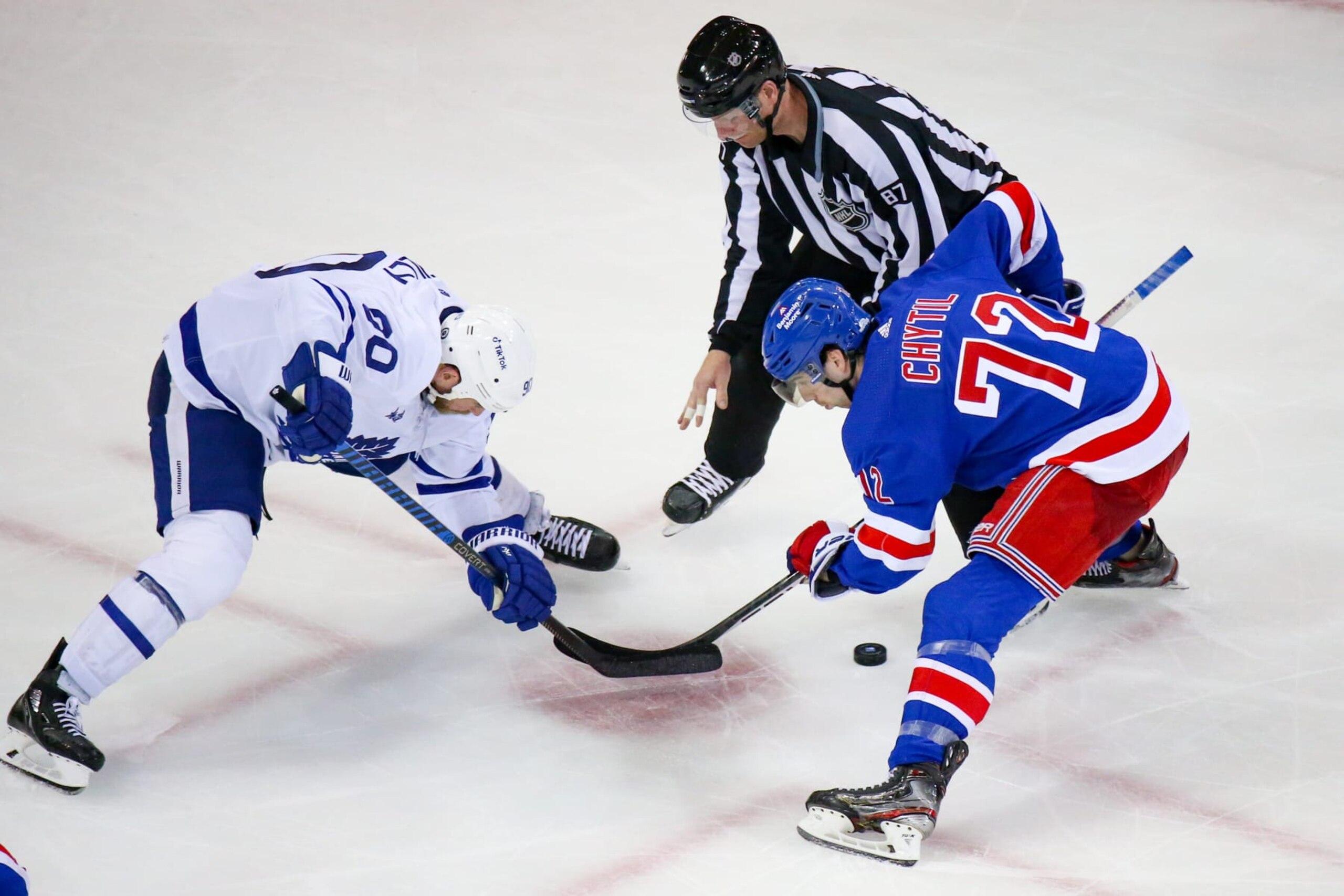 NEW YORK, NY - APRIL 13: Toronto Maple Leafs Center Ryan O'Reilly (90) and New York Rangers Center Filip Chytil (72) face off during the third period of the National Hockey League game between the Toronto Maple Leafs and the New York Rangers on April 13, 2023 at Madison Square Garden in New York, NY. (Photo by Joshua Sarner/Icon Sportswire via Getty Images)