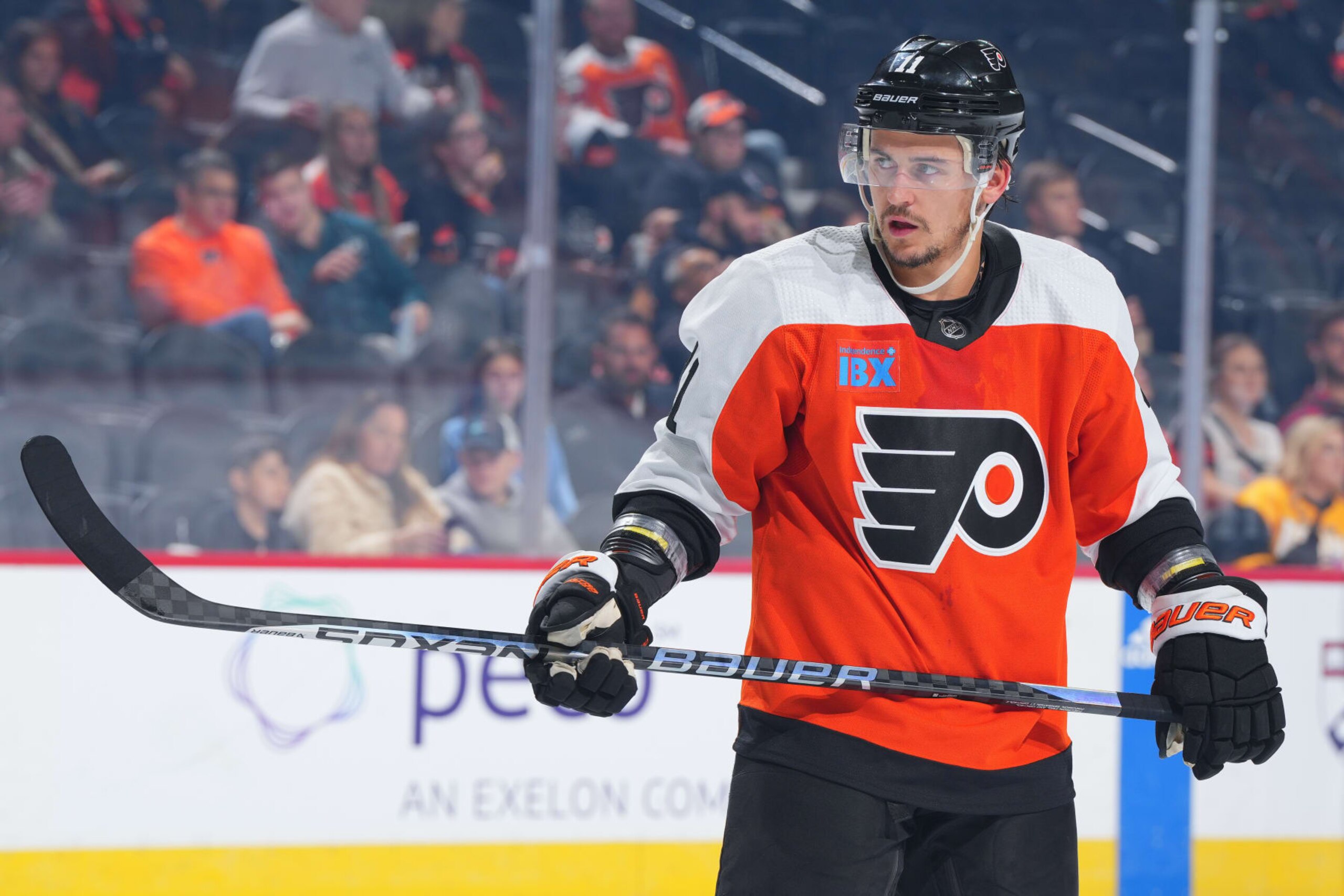 PHILADELPHIA, PENNSYLVANIA - OCTOBER 2: Travis Konecny #11 of the Philadelphia Flyers looks on against the Boston Bruins during the preseason game at the Wells Fargo Center on October 2, 2023 in Philadelphia, Pennsylvania. (Photo by Mitchell Leff/Getty Images)