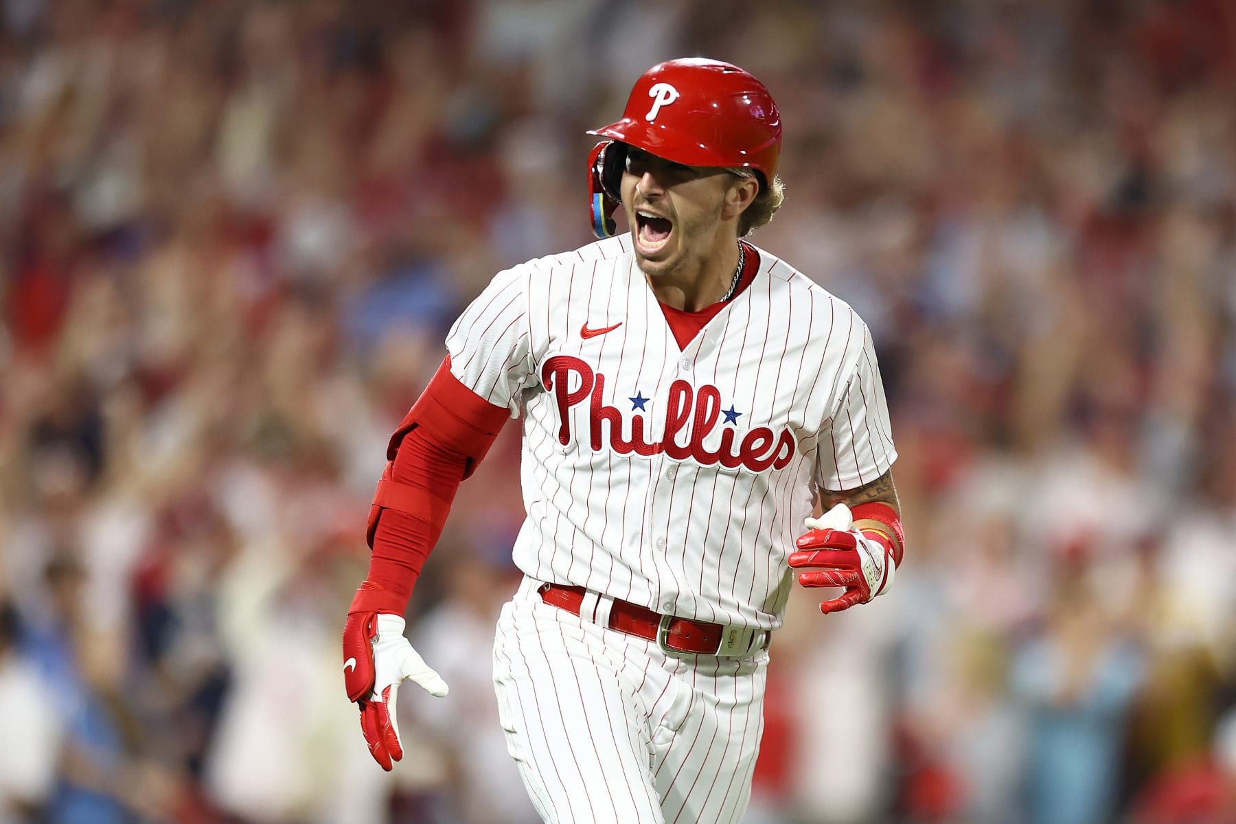 PHILADELPHIA, PENNSYLVANIA - OCTOBER 04: Bryson Stott #5 of the Philadelphia Phillies celebrates after hitting a grand slam during the sixth inning against the Miami Marlins in Game Two of the Wild Card Series at Citizens Bank Park on October 04, 2023 in Philadelphia, Pennsylvania. (Photo by Tim Nwachukwu/Getty Images)