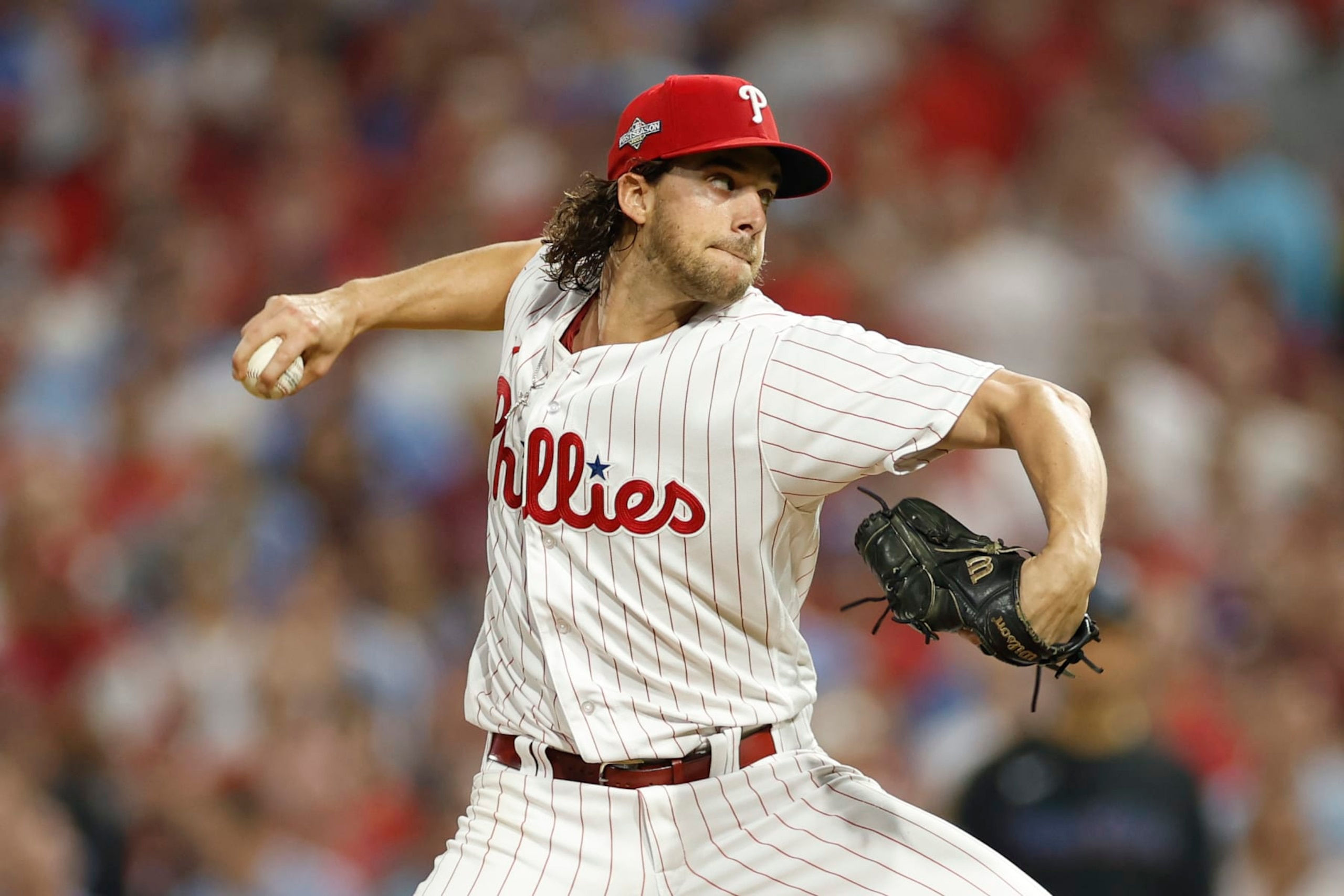 PHILADELPHIA, PENNSYLVANIA - OCTOBER 04: Aaron Nola #27 of the Philadelphia Phillies pitches during the first inning against the Miami Marlins in Game Two of the Wild Card Series at Citizens Bank Park on October 04, 2023 in Philadelphia, Pennsylvania. (Photo by Sarah Stier/Getty Images) PHILADELPHIA, PENNSYLVANIA - OCTOBER 04: Aaron Nola #27 of the Philadelphia Phillies pitches during the first inning against the Miami Marlins in Game Two of the Wild Card Series at Citizens Bank Park on October 04, 2023 in Philadelphia, Pennsylvania. (Photo by Sarah Stier/Getty Images)
