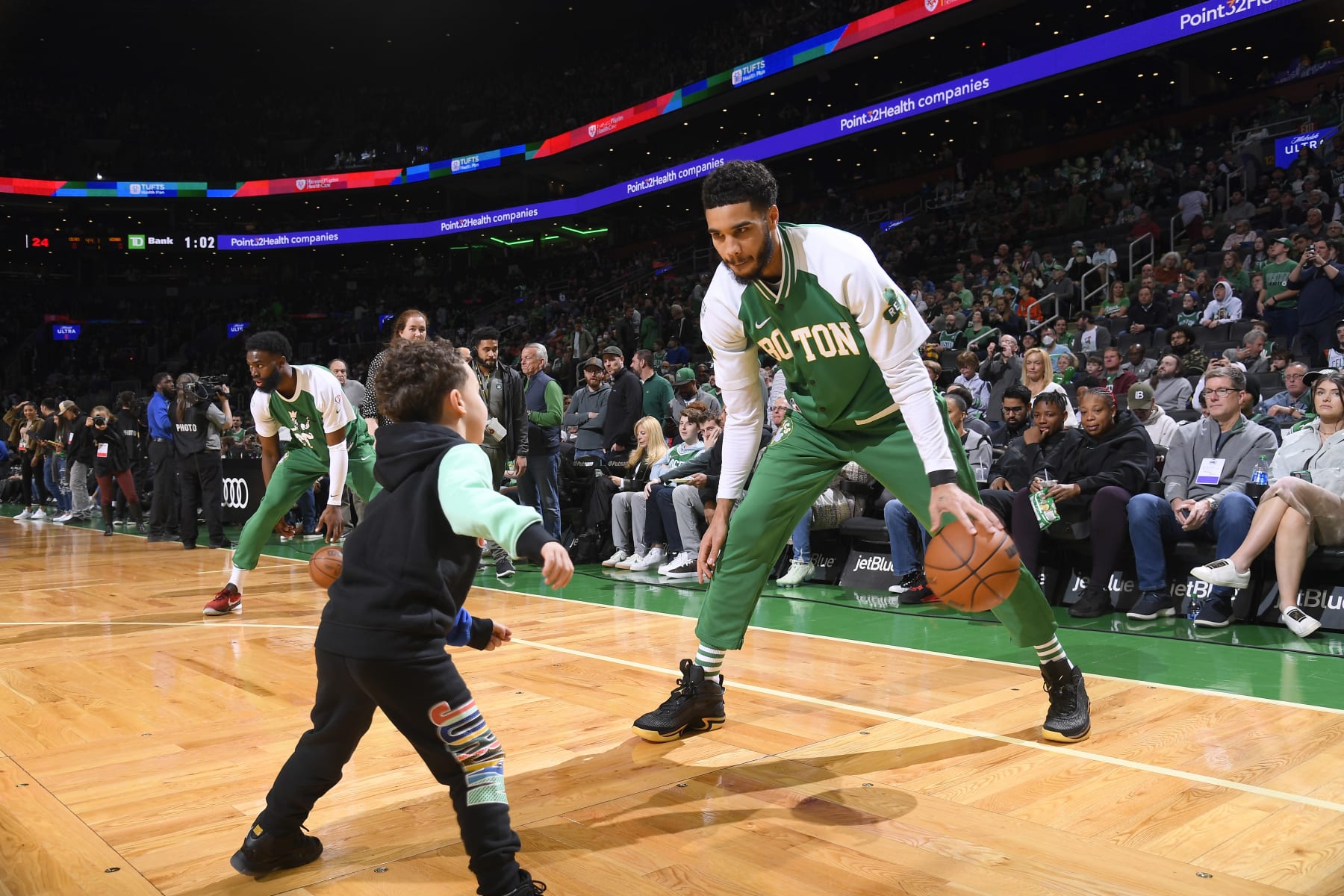 BOSTON, MA - APRIL 3: Jayson Tatum #0 of the Boston Celtics warms up with his child, Duce Tatum prior to the game against the Washington Wizards on April 3, 2022 at the TD Garden in Boston, Massachusetts.  NOTE TO USER: User expressly acknowledges and agrees that, by downloading and or using this photograph, User is consenting to the terms and conditions of the Getty Images License Agreement. Mandatory Copyright Notice: Copyright 2022 NBAE  (Photo by Brian Babineau/NBAE via Getty Images)