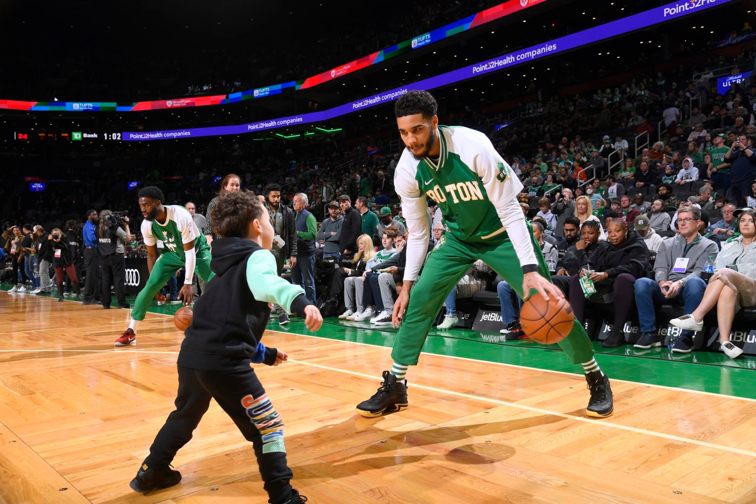 BOSTON, MA - APRIL 3: Jayson Tatum #0 of the Boston Celtics warms up with his child, Duce Tatum prior to the game against the Washington Wizards on April 3, 2022 at the TD Garden in Boston, Massachusetts.  NOTE TO USER: User expressly acknowledges and agrees that, by downloading and or using this photograph, User is consenting to the terms and conditions of the Getty Images License Agreement. Mandatory Copyright Notice: Copyright 2022 NBAE  (Photo by Brian Babineau/NBAE via Getty Images)