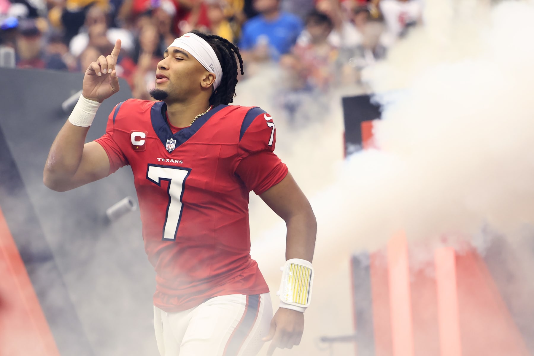 HOUSTON, TEXAS - OCTOBER 01: C.J. Stroud #7 of the Houston Texans runs onto the field prior to a game against the Pittsburgh Steelers at NRG Stadium on October 01, 2023 in Houston, Texas. (Photo by Carmen Mandato/Getty Images)