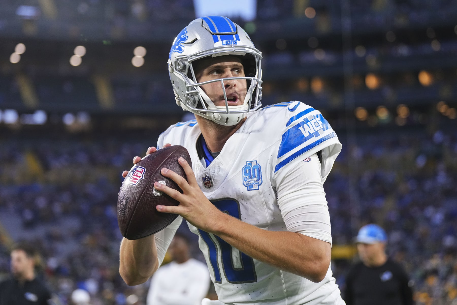 GREEN BAY, WI - SEPTEMBER 28: Jared Goff #16 of the Detroit Lions warms up prior to at Lambeau Field on September 28, 2023 in Green Bay, Wisconsin. (Photo by Cooper Neill/Getty Images)