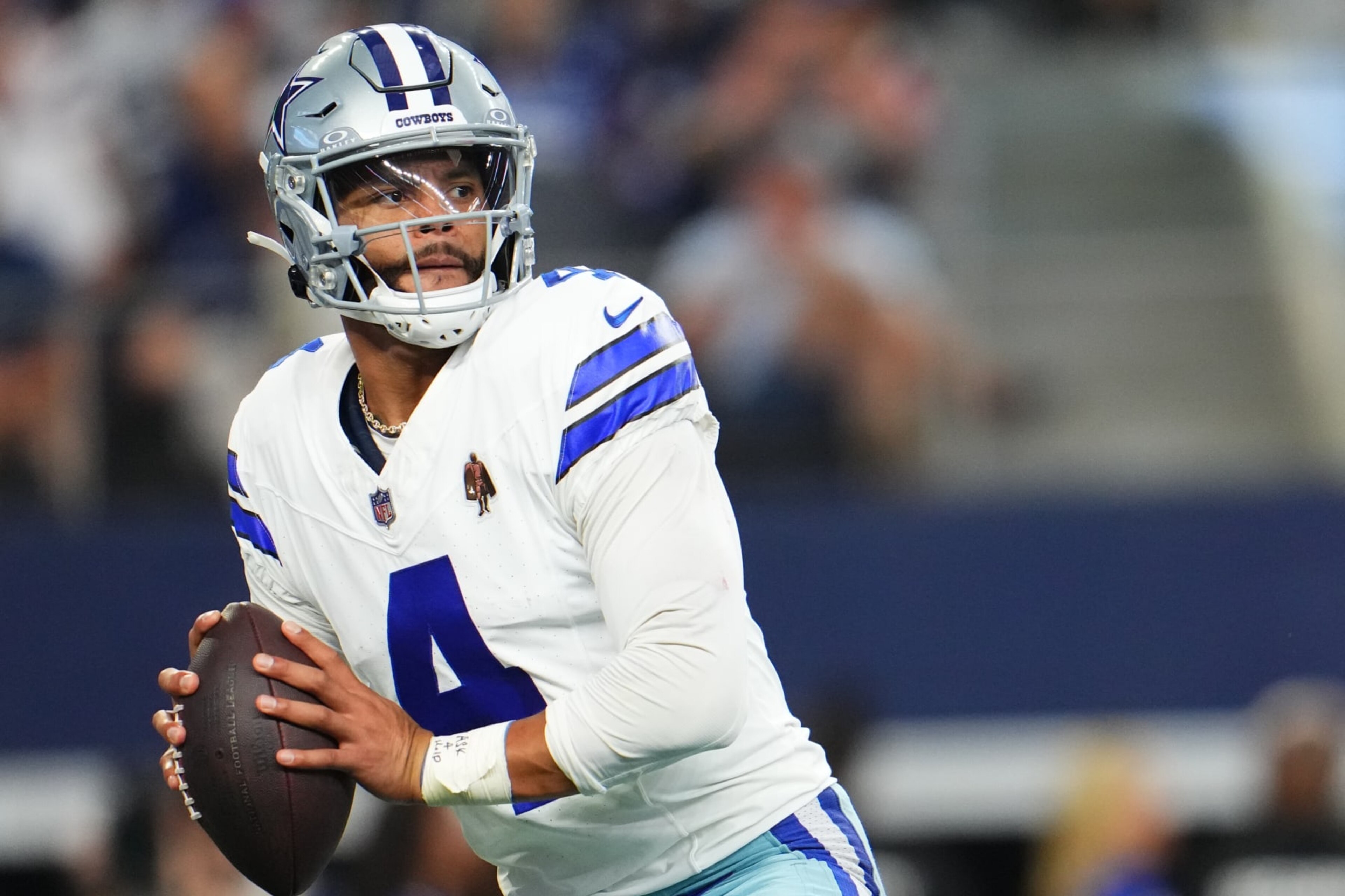 ARLINGTON, TX - OCTOBER 01: Dak Prescott #4 of the Dallas Cowboys drops back to pass against the New England Patriots during the second half at AT&T Stadium on October 1, 2023 in Arlington, Texas. (Photo by Cooper Neill/Getty Images)