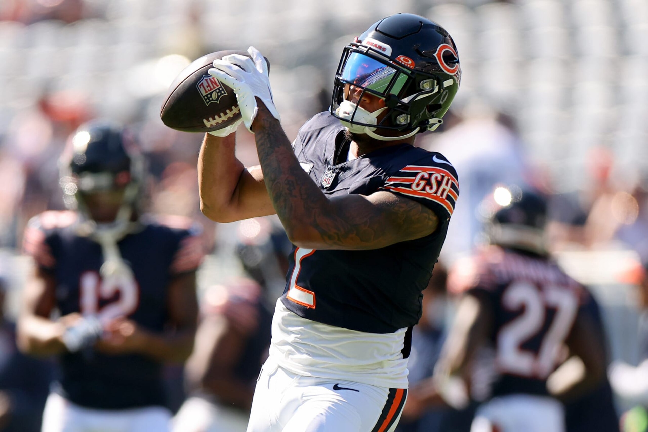 CHICAGO, ILLINOIS - OCTOBER 01: DJ Moore #2 of the Chicago Bears warms up before the game against the Denver Broncos at Soldier Field on October 01, 2023 in Chicago, Illinois. (Photo by Michael Reaves/Getty Images)