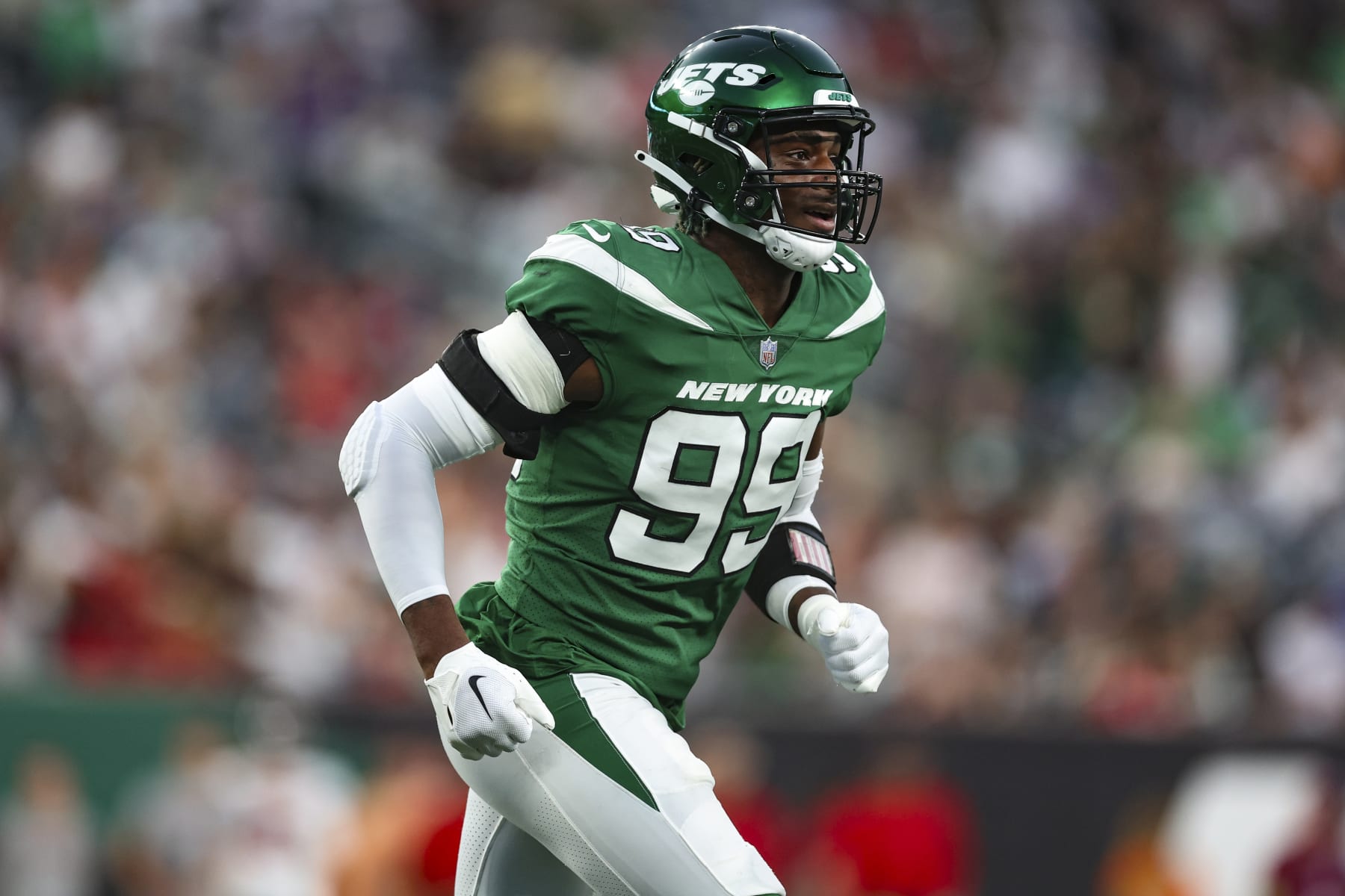 EAST RUTHERFORD, NJ - AUGUST 19: Will McDonald IV #99 of the New York Jets runs out onto the field against the Tampa Bay Buccaneers during the first half at MetLife Stadium on Saturday, August 19, 2023, in East Rutherford, New Jersey. (Perry Knotts/Getty Images)