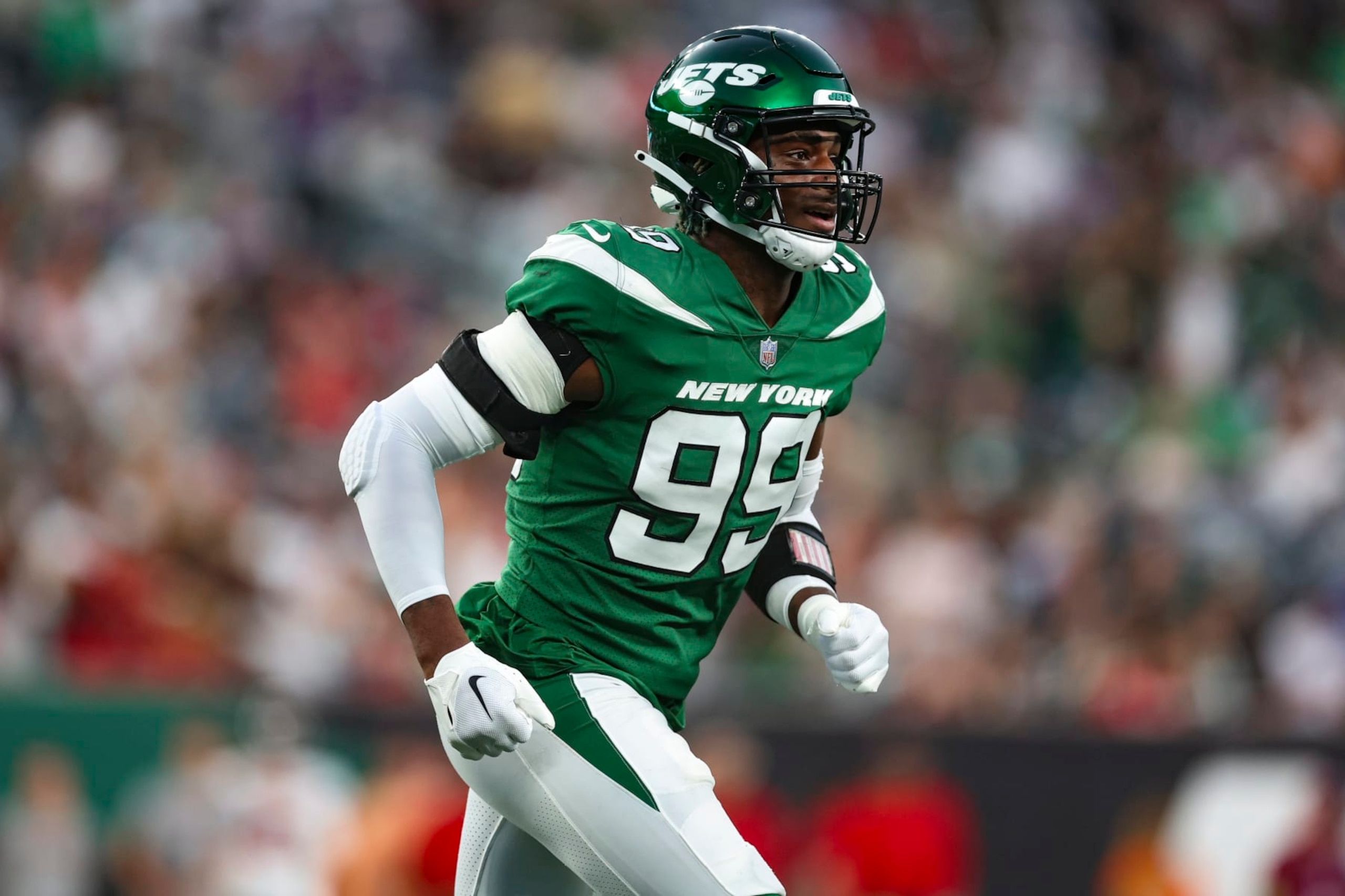EAST RUTHERFORD, NJ - AUGUST 19: Will McDonald IV #99 of the New York Jets runs out onto the field against the Tampa Bay Buccaneers during the first half at MetLife Stadium on Saturday, August 19, 2023, in East Rutherford, New Jersey. (Perry Knotts/Getty Images)