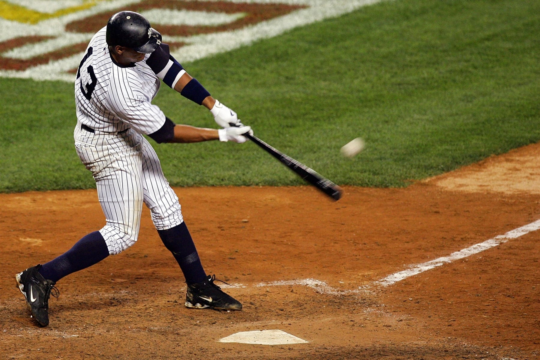 NEW YORK - OCTOBER 08:  Alex Rodriguez #13 of the New York Yankees hits a solo home run seventh inning against the Cleveland Indians during Game Four of the American League Division Series at Yankee Stadium on October 8, 2007 in the Bronx borough of New York City.  (Photo by Jim McIsaac/Getty Images)
