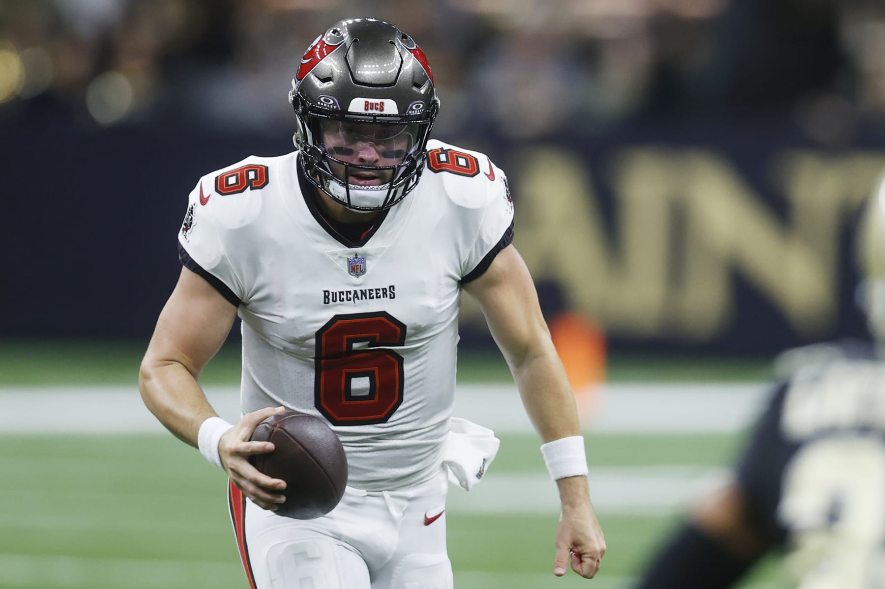 NEW ORLEANS, LOUISIANA - OCTOBER 01: Baker Mayfield #6 of the Tampa Bay Buccaneers scrambles during the first half against the New Orleans Saints at Caesars Superdome on October 01, 2023 in New Orleans, Louisiana. (Photo by Chris Graythen/Getty Images)