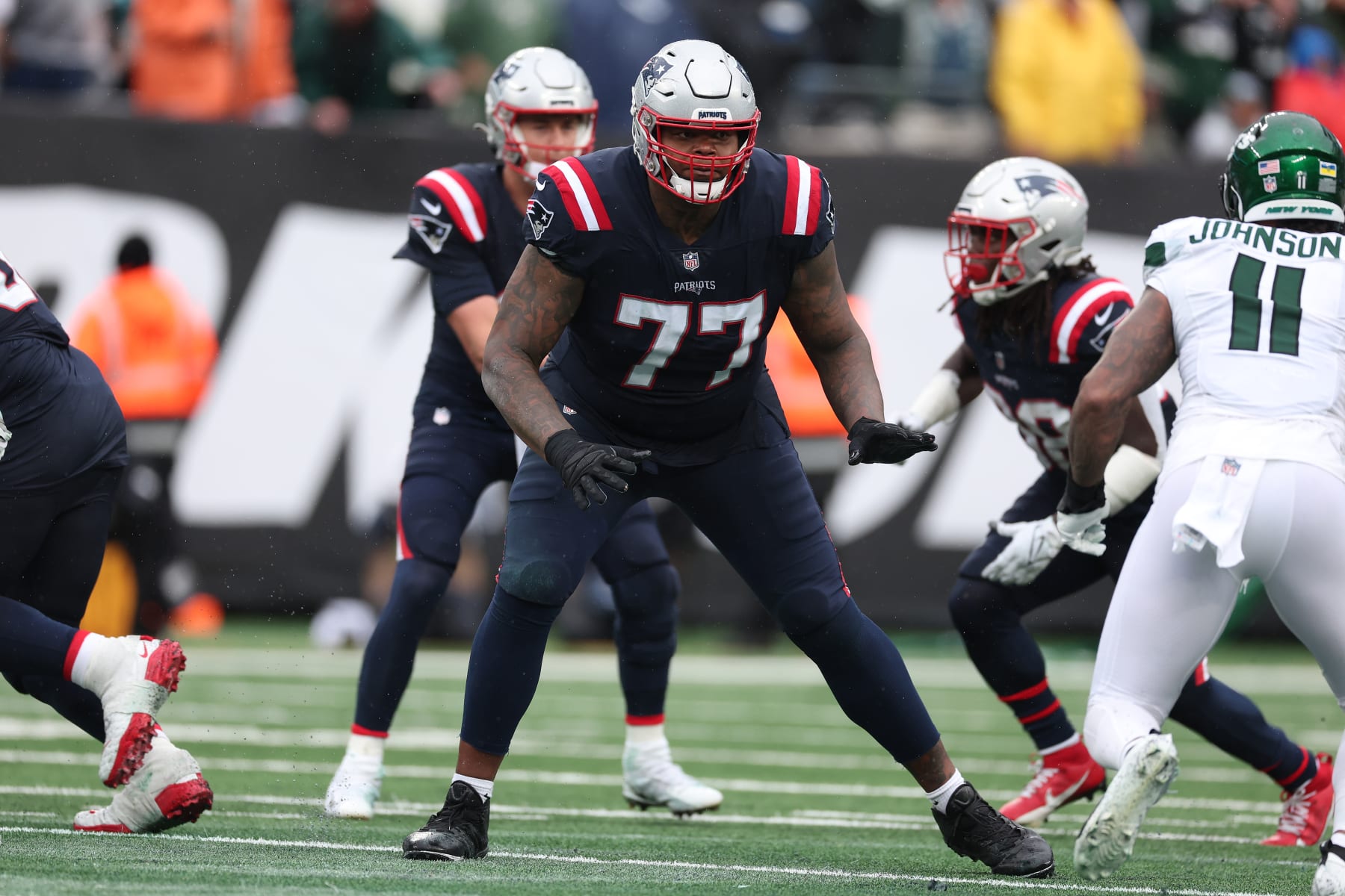 EAST RUTHERFORD, NEW JERSEY - SEPTEMBER 24:  Trent Brown #77 of the New England Patriots in action against the New York Jets during their game at MetLife Stadium on September 24, 2023 in East Rutherford, New Jersey.  (Photo by Al Bello/Getty Images)