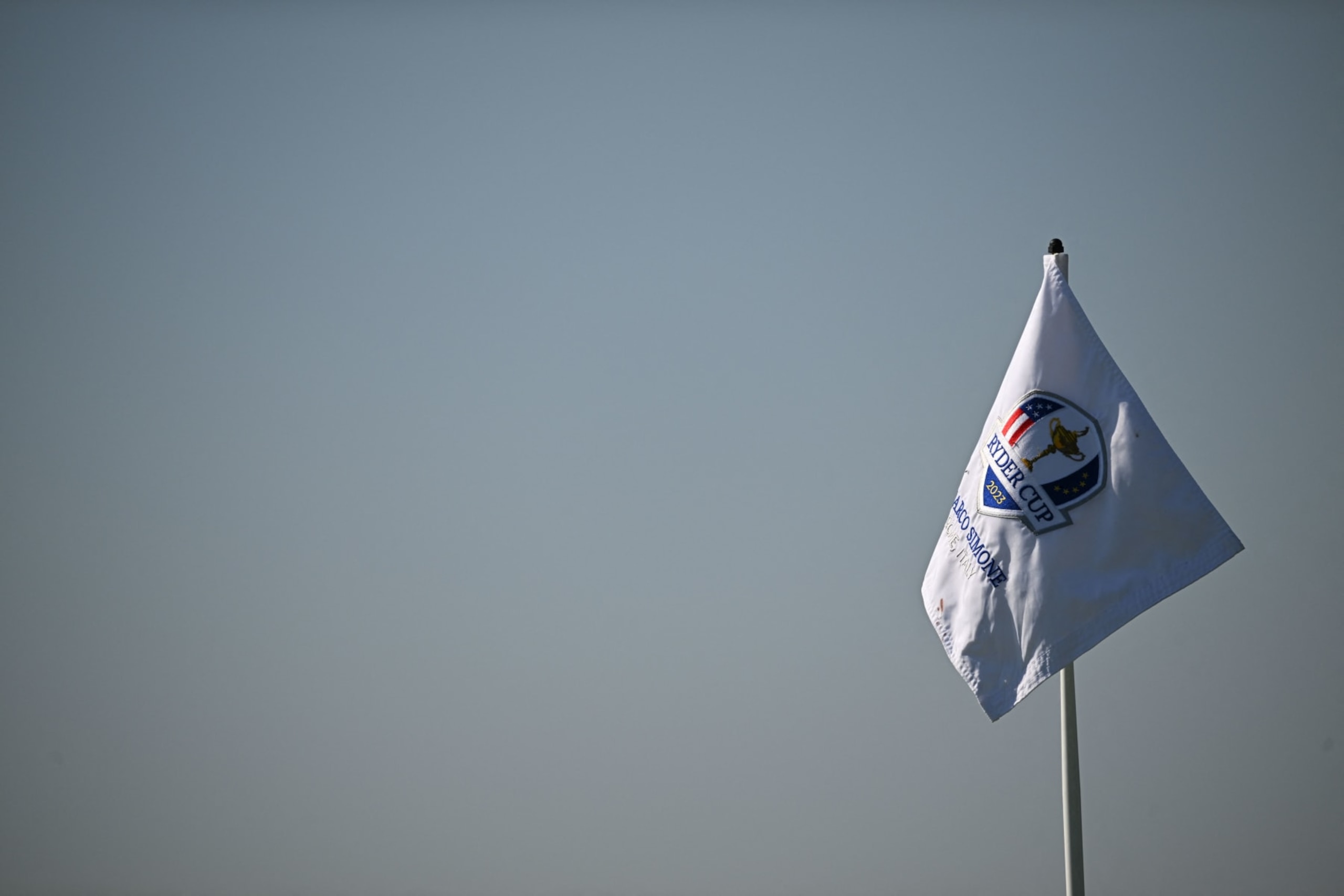 The RyderCup logo flutters on the 13th green flag during a foursomes match on the first day of play in the 44th Ryder Cup at the Marco Simone Golf and Country Club in Rome on September 29, 2023. (Photo by Paul ELLIS / AFP) (Photo by PAUL ELLIS/AFP via Getty Images)