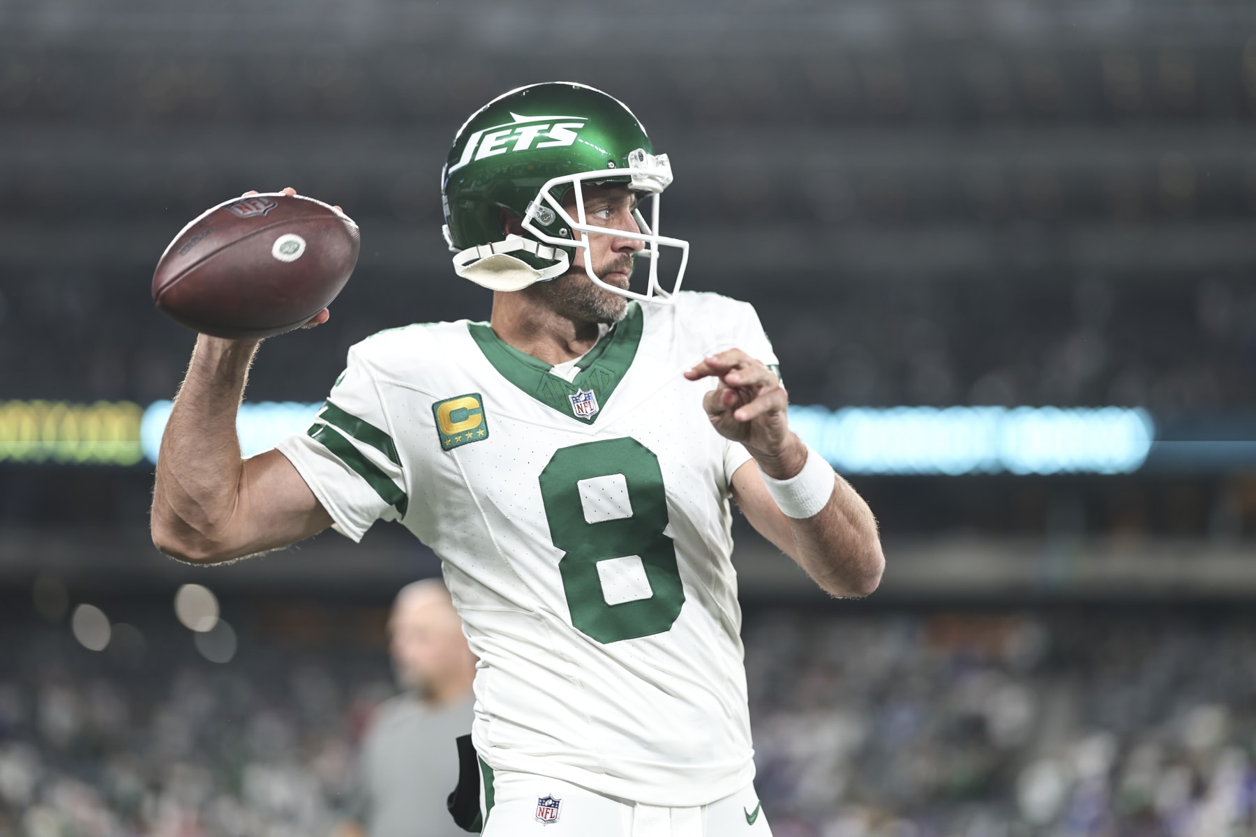 EAST RUTHERFORD, NEW JERSEY - SEPTEMBER 11: Aaron Rodgers #8 of the New York Jets passes as he warms up prior to a game against the Buffalo Bills at MetLife Stadium on September 11, 2023 in East Rutherford, New Jersey. (Photo by Michael Owens/Getty Images)