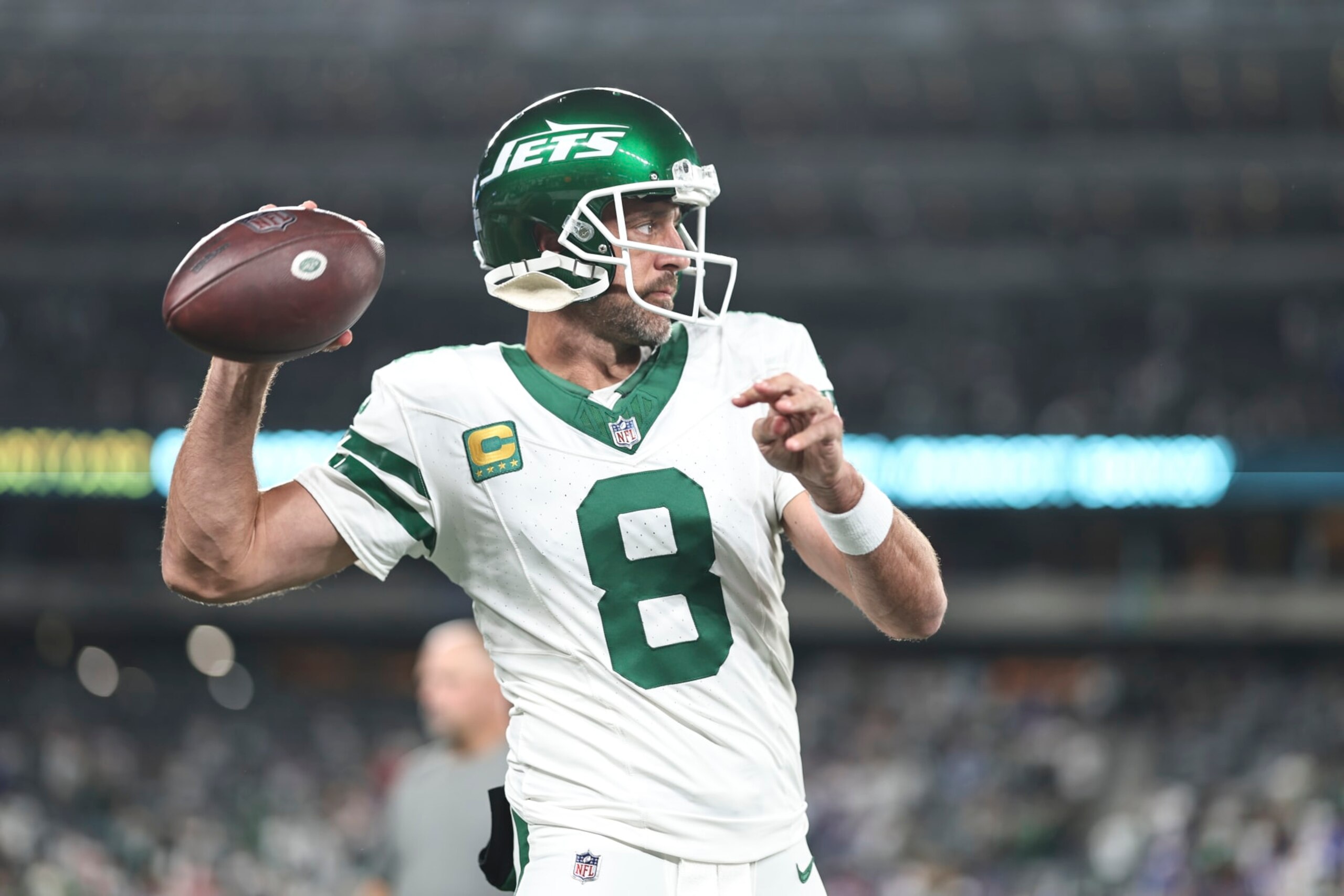 EAST RUTHERFORD, NEW JERSEY - SEPTEMBER 11: Aaron Rodgers #8 of the New York Jets passes as he warms up prior to a game against the Buffalo Bills at MetLife Stadium on September 11, 2023 in East Rutherford, New Jersey. (Photo by Michael Owens/Getty Images)