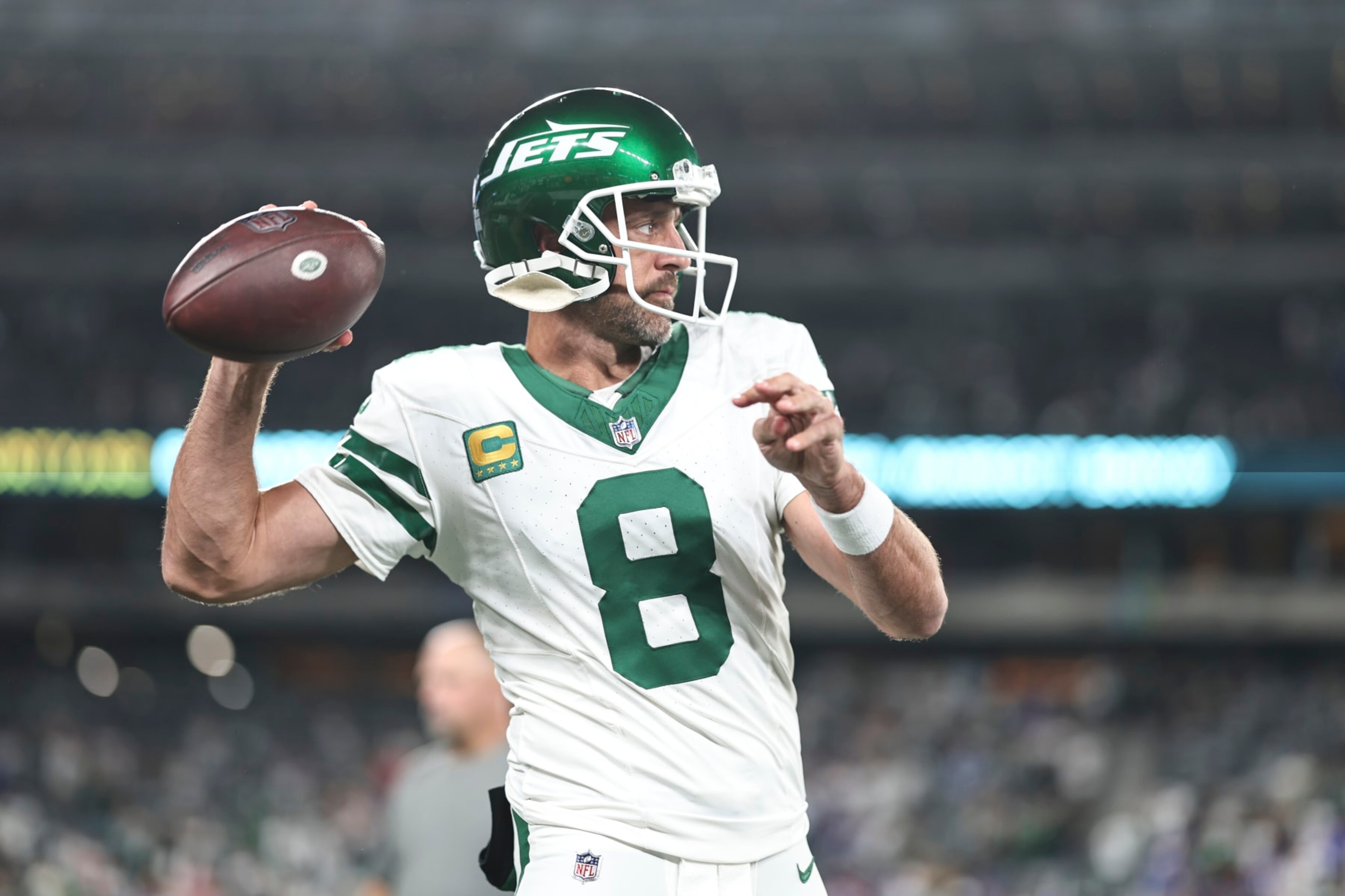 EAST RUTHERFORD, NEW JERSEY - SEPTEMBER 11: Aaron Rodgers #8 of the New York Jets passes as he warms up prior to a game against the Buffalo Bills at MetLife Stadium on September 11, 2023 in East Rutherford, New Jersey. (Photo by Michael Owens/Getty Images)