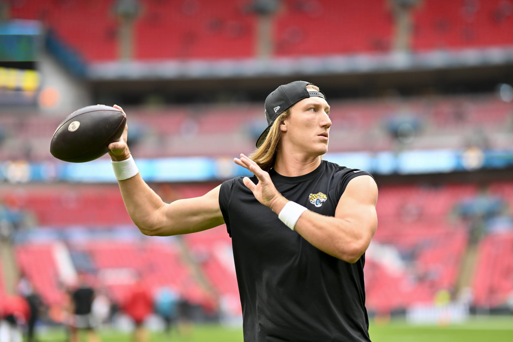 WEMBLEY, ENGLAND - OCTOBER 01: Trevor Lawrence #16 of the Jacksonville Jaguars warms up before an NFL football game against the Atlanta Falcons at Wembley Stadium on October 01, 2023 in Wembley, England. (Photo by Alika Jenner/Getty Images)