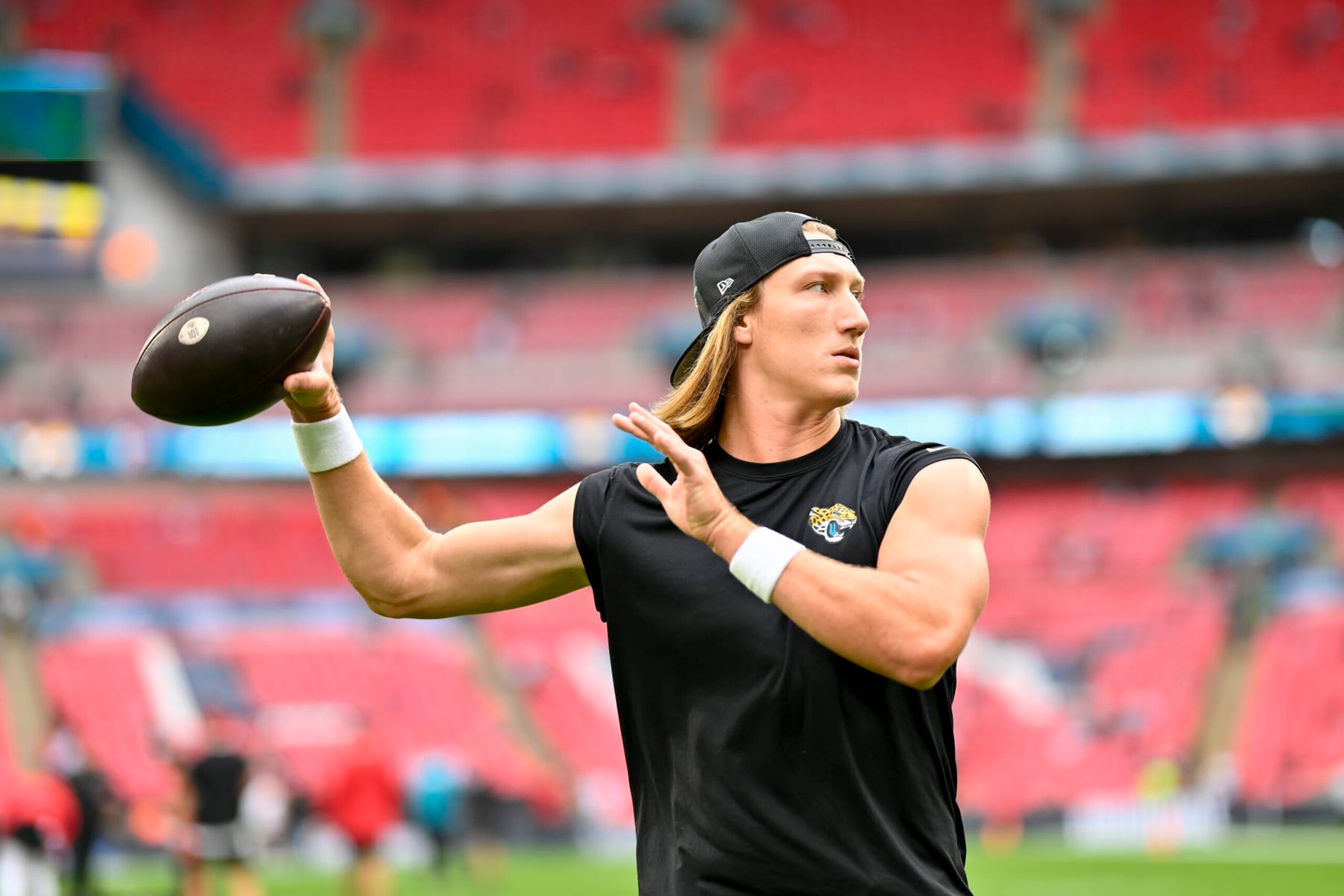 WEMBLEY, ENGLAND - OCTOBER 01: Trevor Lawrence #16 of the Jacksonville Jaguars warms up before an NFL football game against the Atlanta Falcons at Wembley Stadium on October 01, 2023 in Wembley, England. (Photo by Alika Jenner/Getty Images)