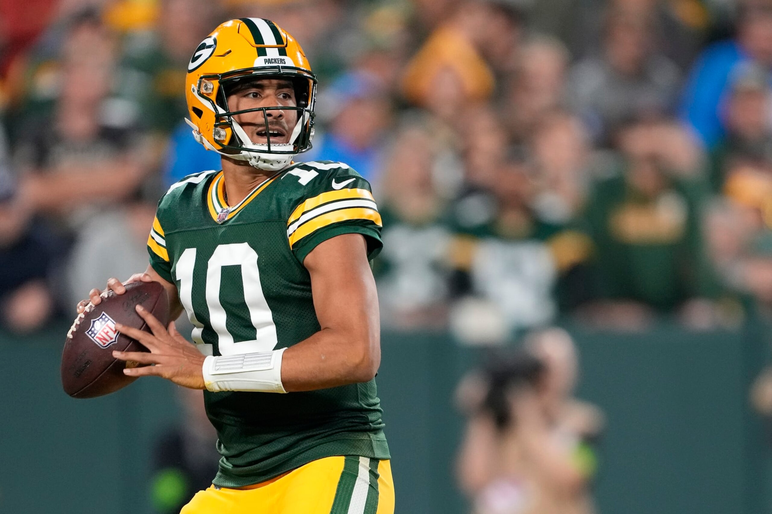 GREEN BAY, WISCONSIN - SEPTEMBER 28: Jordan Love #10 of the Green Bay Packers looks to throw a pass against the Detroit Lions during the first half in the game at Lambeau Field on September 28, 2023 in Green Bay, Wisconsin. (Photo by Patrick McDermott/Getty Images)