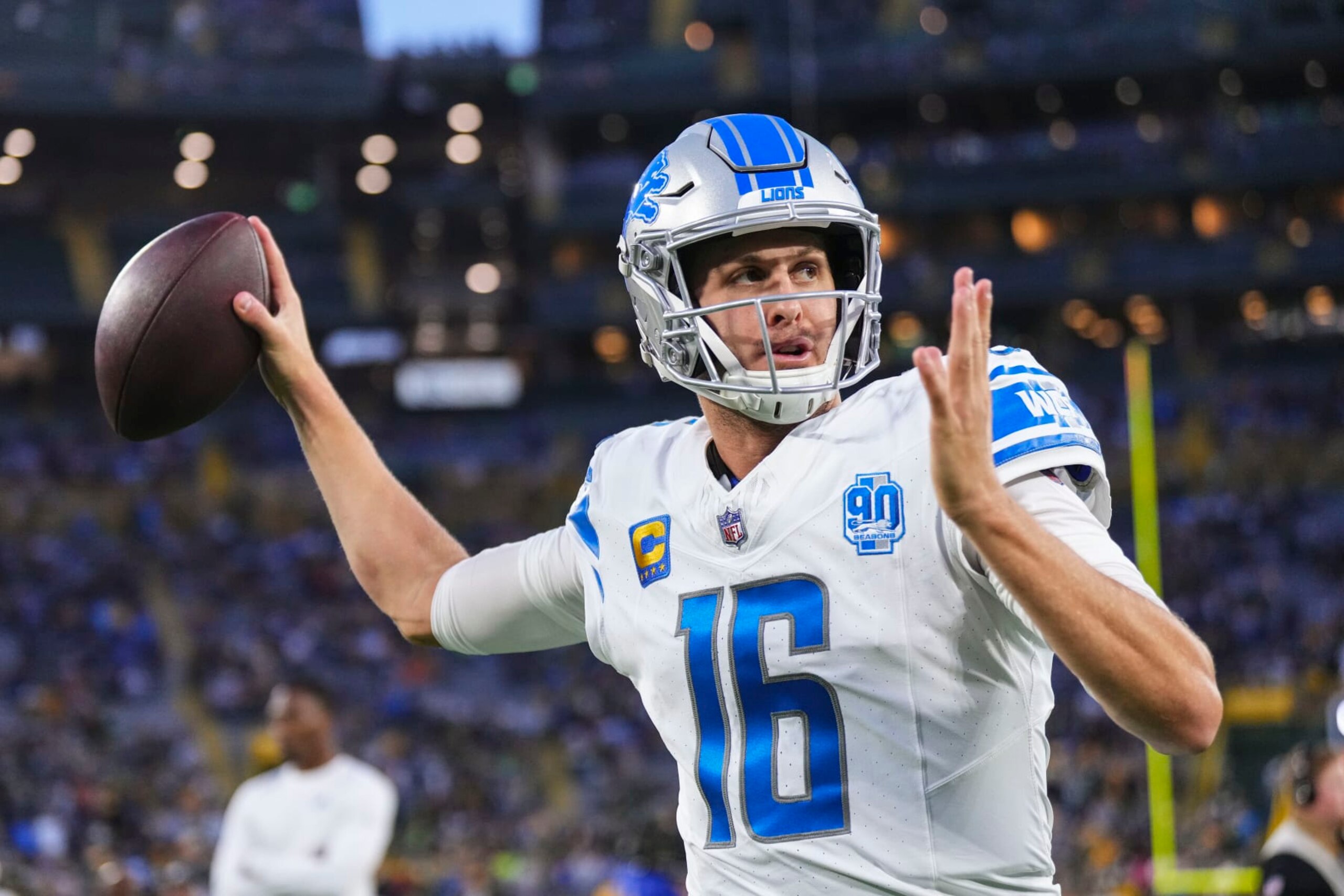 GREEN BAY, WI - SEPTEMBER 28: Jared Goff #16 of the Detroit Lions warms up prior to at Lambeau Field on September 28, 2023 in Green Bay, Wisconsin. (Photo by Cooper Neill/Getty Images)
