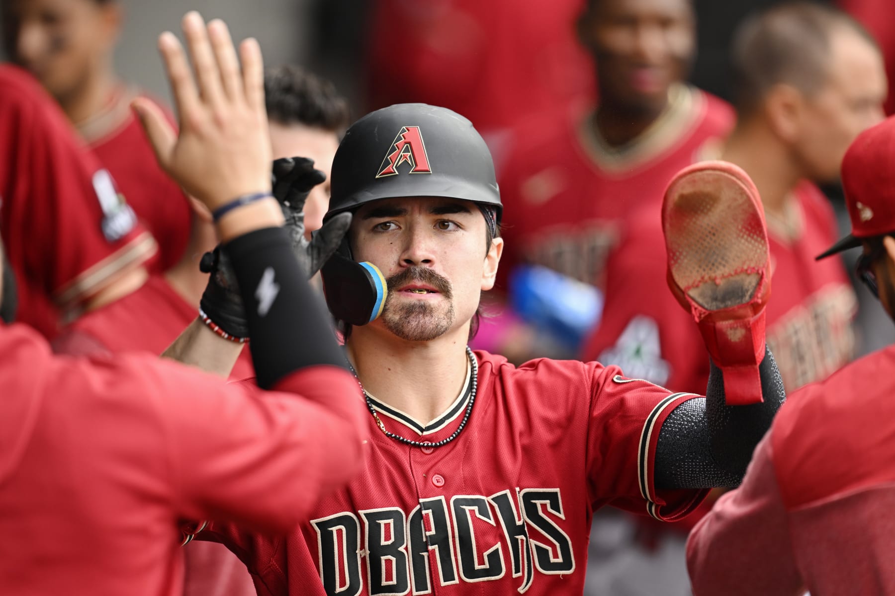 CHICAGO, ILLINOIS - SEPTEMBER 27: Corbin Carroll #7 of the Arizona Diamondbacks celebrates after scoring in the third inning against the Chicago White Sox at Guaranteed Rate Field on September 27, 2023 in Chicago, Illinois. (Photo by Quinn Harris/Getty Images)