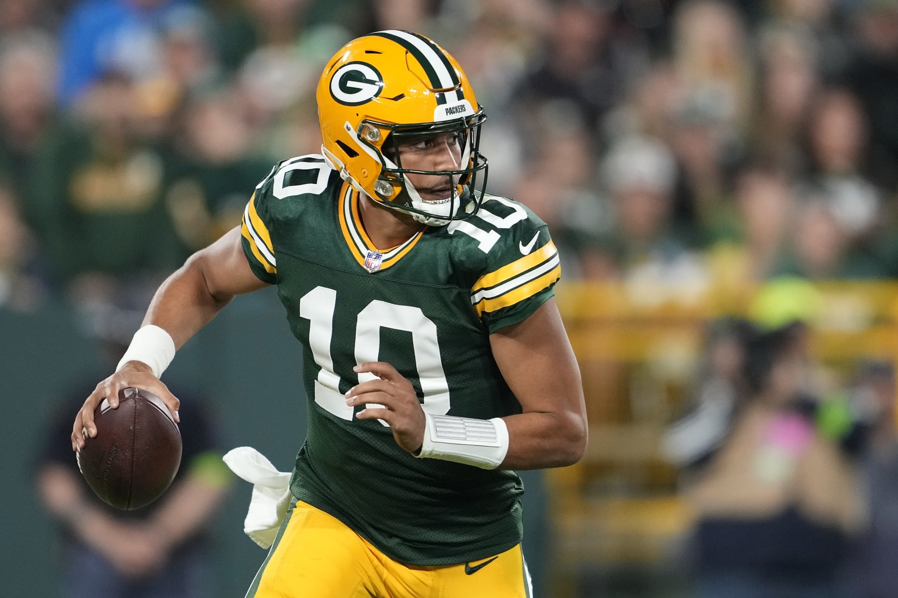 GREEN BAY, WISCONSIN - SEPTEMBER 28: Jordan Love #10 of the Green Bay Packers looks to throw a pass against the Detroit Lions during the first half in the game at Lambeau Field on September 28, 2023 in Green Bay, Wisconsin. (Photo by Patrick McDermott/Getty Images)