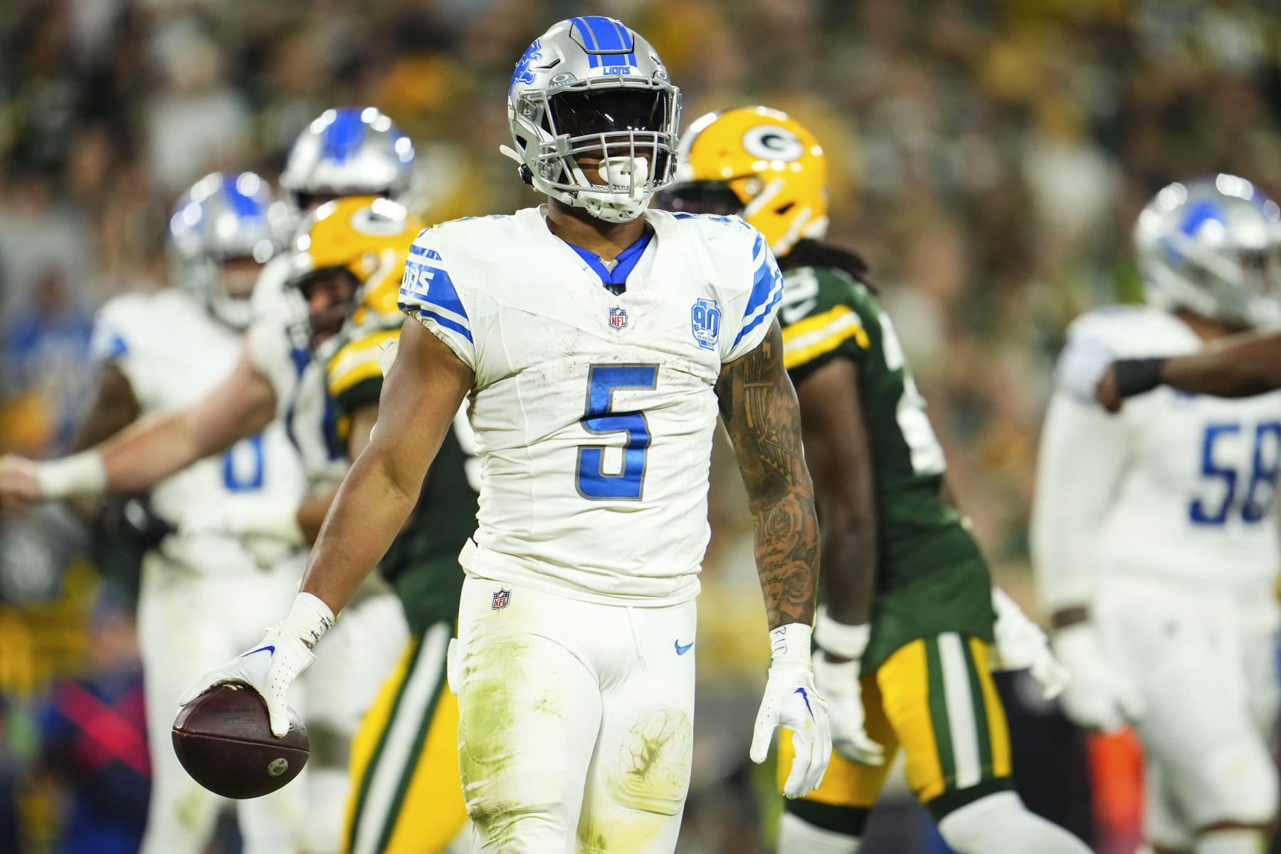 GREEN BAY, WI - SEPTEMBER 28: David Montgomery #5 of the Detroit Lions celebrates during an NFL football game at Lambeau Field on September 28, 2023 in Green Bay, Wisconsin. (Photo by Cooper Neill/Getty Images)