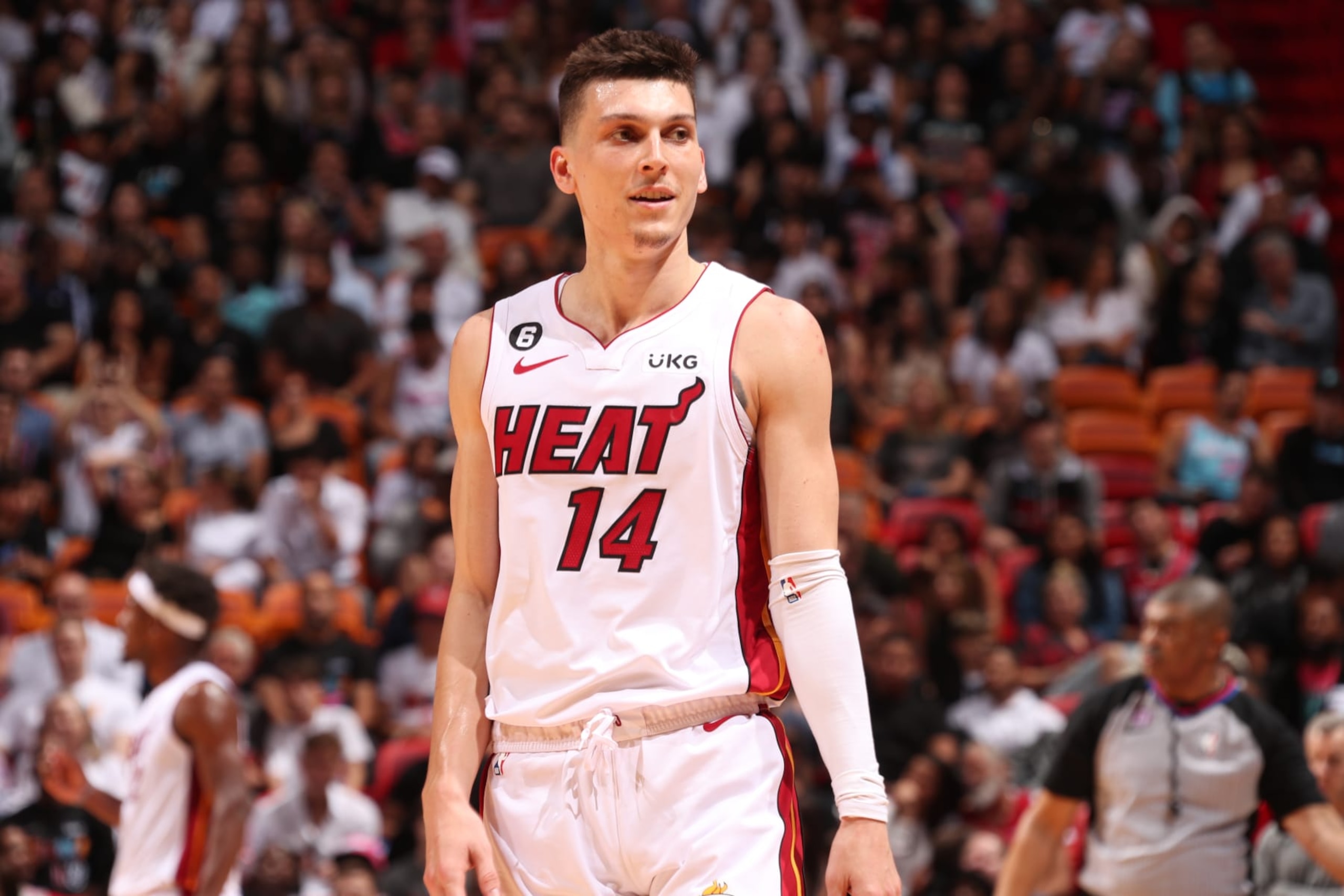 MIAMI, FL - APRIL 14: Tyler Herro #14 of the Miami Heat looks on during the game against the Chicago Bulls during the 2023 Play-In Tournament on April 14, 2023 at the Kaseya Center in Miami, Florida. NOTE TO USER: User expressly acknowledges and agrees that, by downloading and or using this Photograph, user is consenting to the terms and conditions of the Getty Images License Agreement. Mandatory Copyright Notice: Copyright 2023 NBAE (Photo by Issac Baldizon/NBAE via Getty Images)