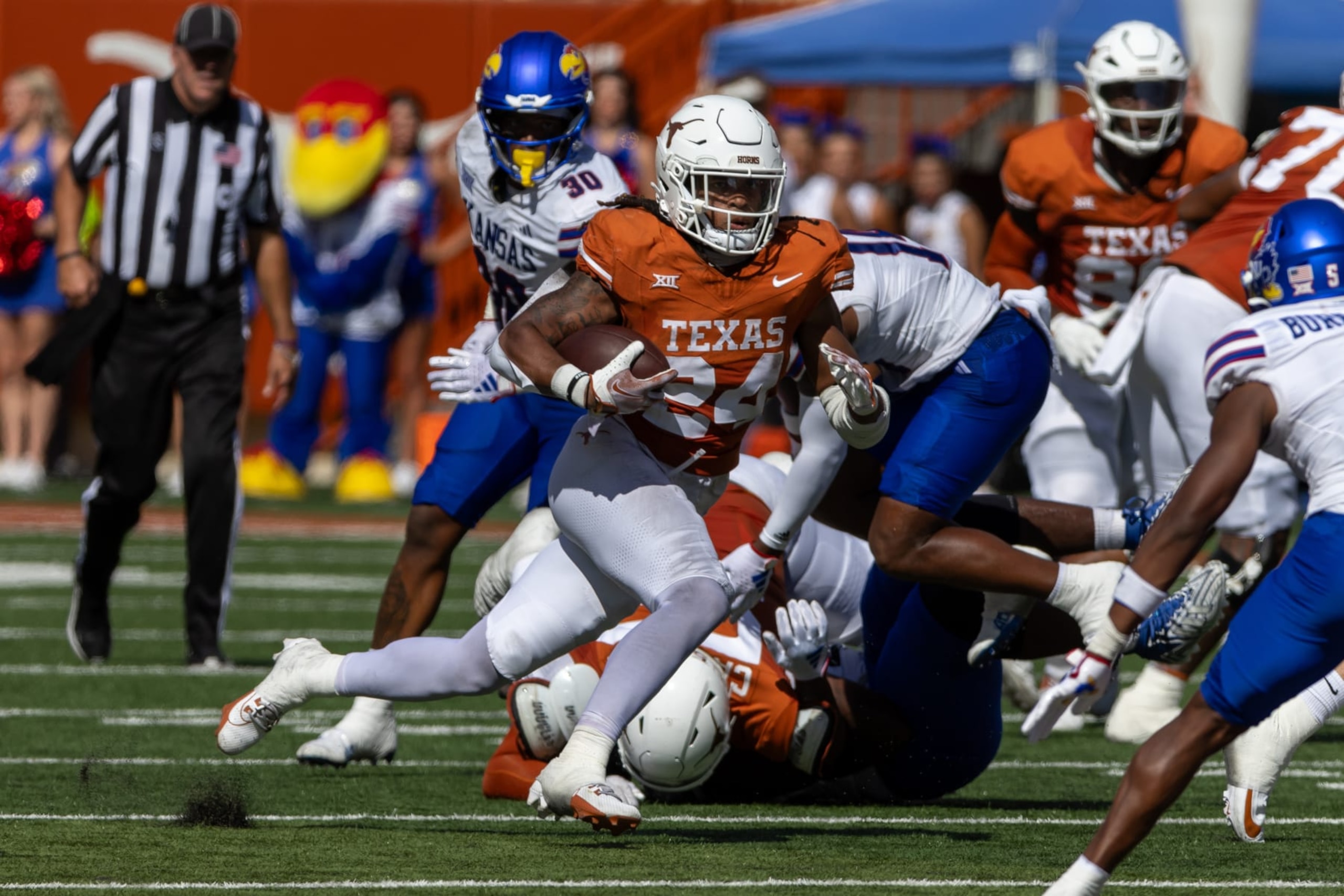 AUSTIN, TX - SEPTEMBER 30: Texas Longhorns running back Jonathon Brooks (24) runs the ball during the Big 12 football game between Texas Longhorns and Kansas Jayhawks on September 30, 2023, at Darrell K Royal-Texas Memorial Stadium in Austin, TX. (Photo by David Buono/Icon Sportswire via Getty Images)