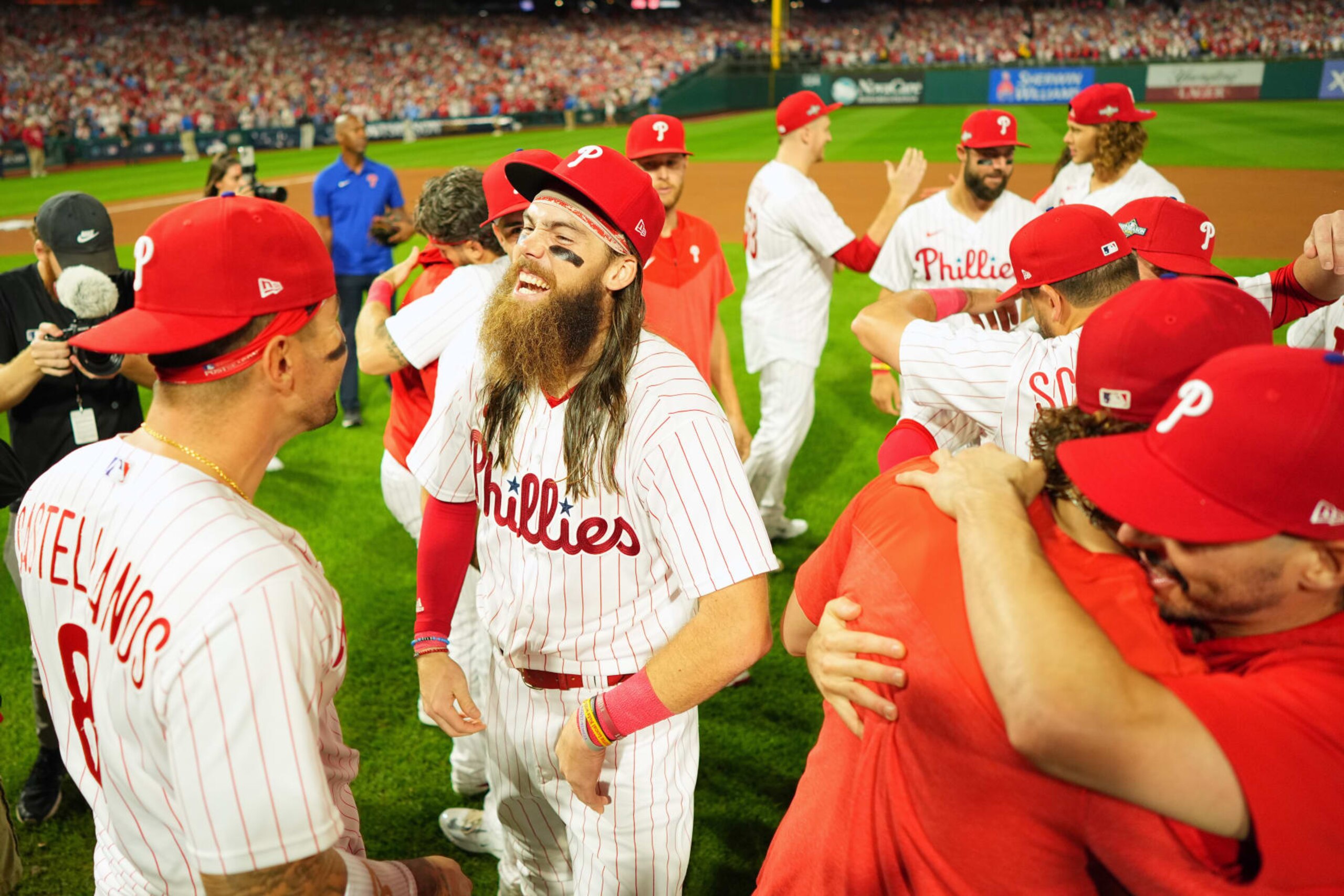 PHILADELPHIA, PA - OCTOBER 04: Brandon Marsh #16 of the Philadelphia Phillies celebrates with teammates after Game 2 of the Wild Card Series against the Miami Marlins at Citizens Bank Park on Wednesday, October 4, 2023 in Philadelphia, Pennsylvania. (Photo by Rob Tringali/MLB Photos via Getty Images) PHILADELPHIA, PA - OCTOBER 04: Brandon Marsh #16 of the Philadelphia Phillies celebrates with teammates after Game 2 of the Wild Card Series against the Miami Marlins at Citizens Bank Park on Wednesday, October 4, 2023 in Philadelphia, Pennsylvania. (Photo by Rob Tringali/MLB Photos via Getty Images)