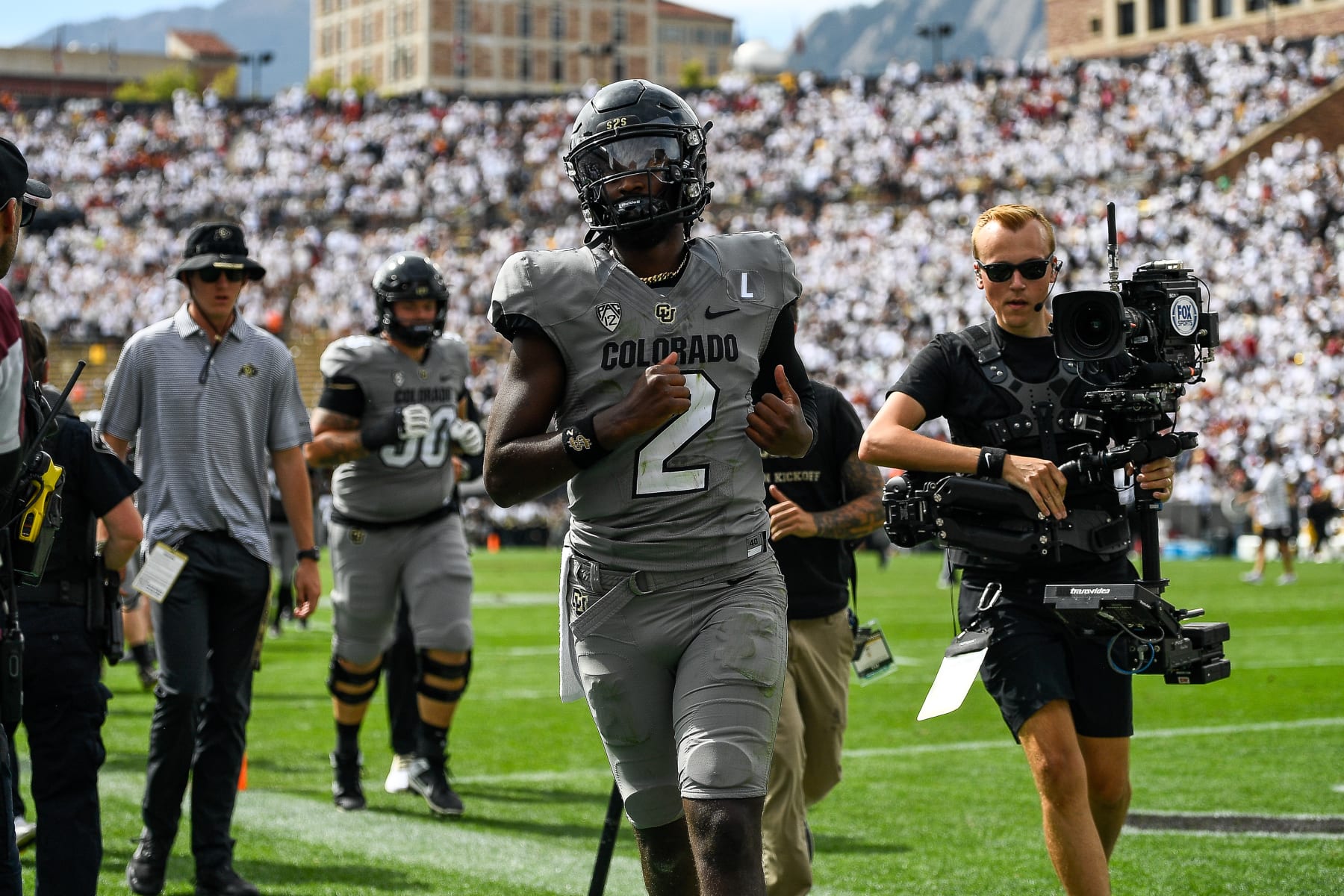 BOULDER, CO - SEPTEMBER 30:  Quarterback Shedeur Sanders #2 of the Colorado Buffaloes runs off the field at halftime of a game against the USC Trojans at Folsom Field on September 30, 2023 in Boulder, Colorado. (Photo by Dustin Bradford/Getty Images)