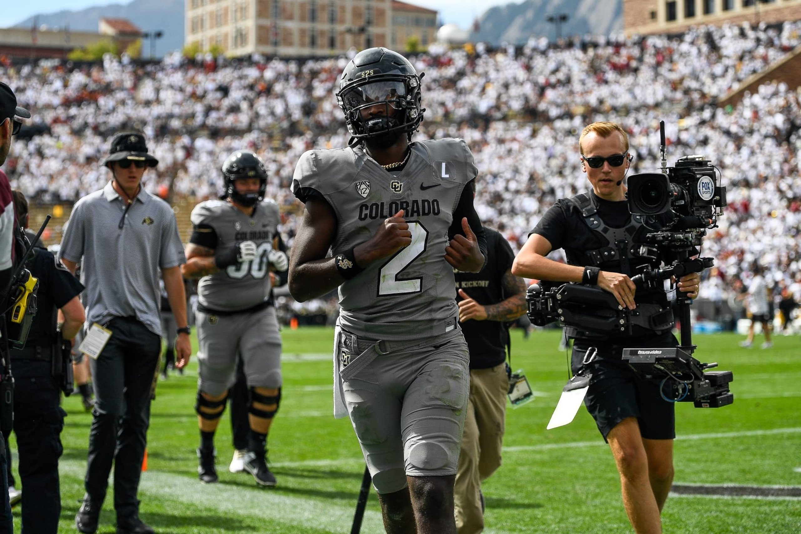 BOULDER, CO - SEPTEMBER 30:  Quarterback Shedeur Sanders #2 of the Colorado Buffaloes runs off the field at halftime of a game against the USC Trojans at Folsom Field on September 30, 2023 in Boulder, Colorado. (Photo by Dustin Bradford/Getty Images)