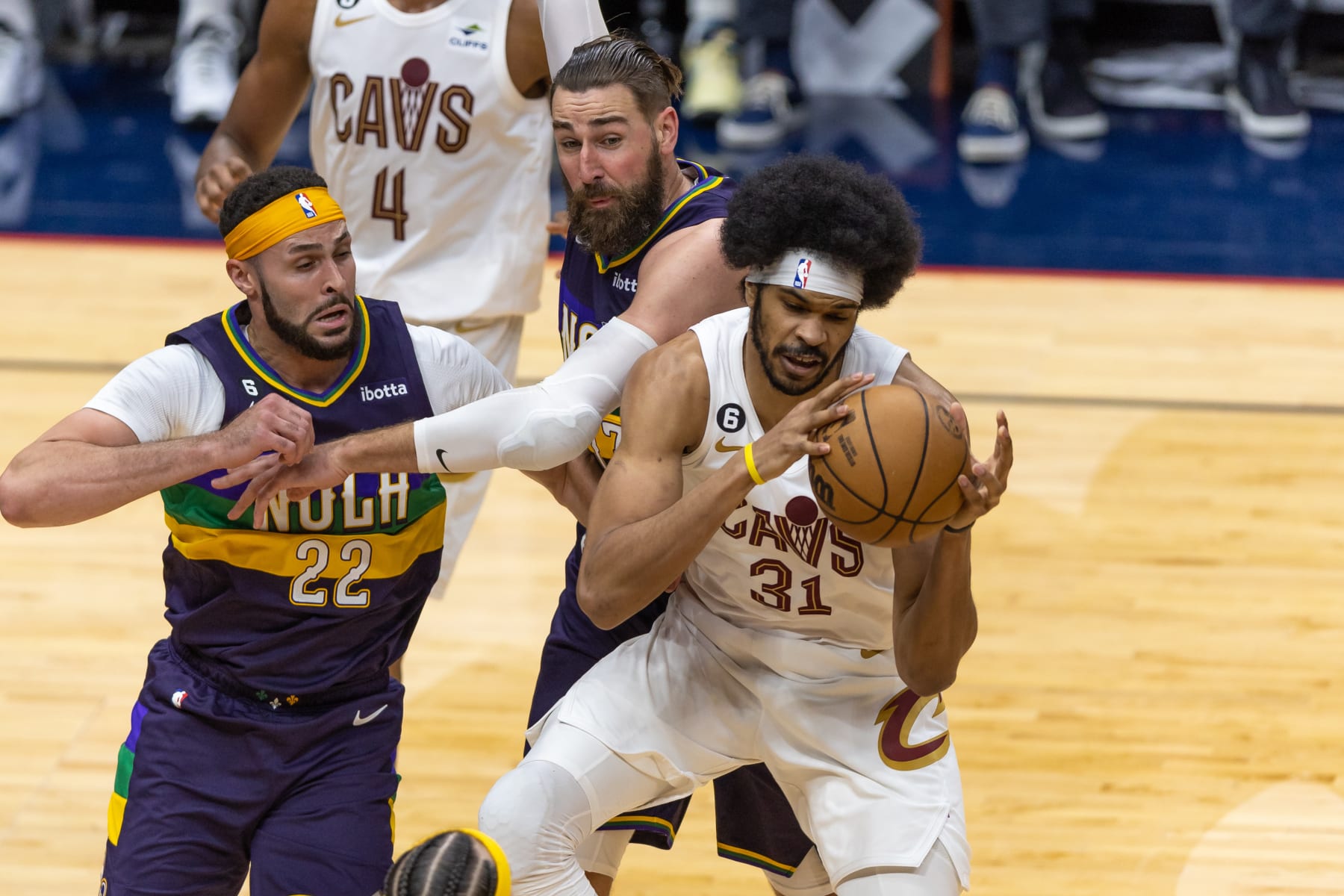 NEW ORLEANS, LA - FEBRUARY 10:  Cleveland Cavaliers center Jarrett Allen (31) grabs a rebound against New Orleans Pelicans center Jonas Valanciunas (17) and New Orleans Pelicans forward Larry Nance Jr. (22) during a NBA game between the New Orleans Pelicans and the Cleveland Cavaliers on February 10, 2023, at Smoothie King Center in New Orleans, LA. (Photo by Stephen Lew/Icon Sportswire via Getty Images)