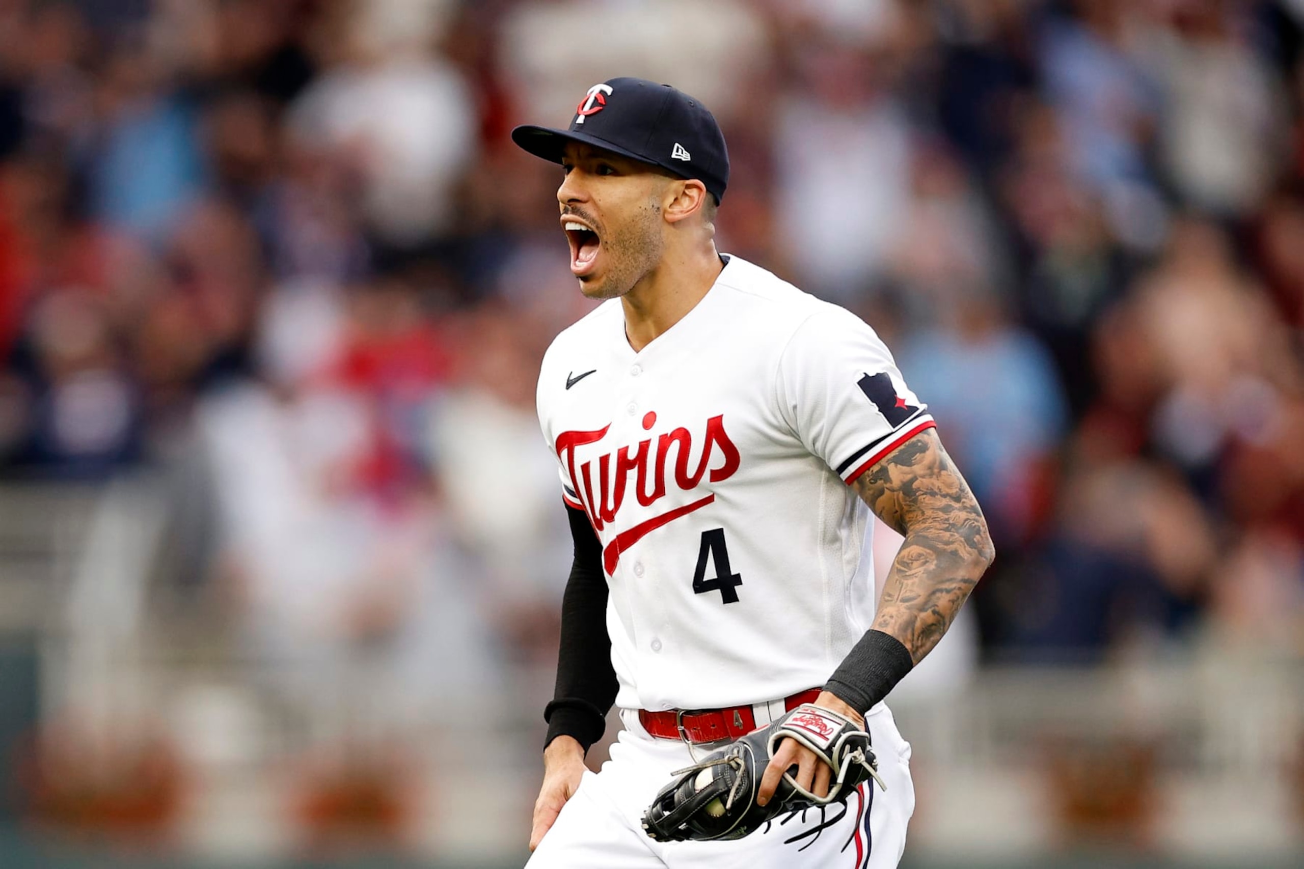 MINNEAPOLIS, MINNESOTA - OCTOBER 04: Carlos Correa #4 of the Minnesota Twins celebrates after tagging out Vladimir Guerrero Jr. #27 of the Toronto Blue Jays at second base during the fifth inning in Game Two of the Wild Card Series at Target Field on October 04, 2023 in Minneapolis, Minnesota. (Photo by David Berding/Getty Images) MINNEAPOLIS, MINNESOTA - OCTOBER 04: Carlos Correa #4 of the Minnesota Twins celebrates after tagging out Vladimir Guerrero Jr. #27 of the Toronto Blue Jays at second base during the fifth inning in Game Two of the Wild Card Series at Target Field on October 04, 2023 in Minneapolis, Minnesota. (Photo by David Berding/Getty Images)