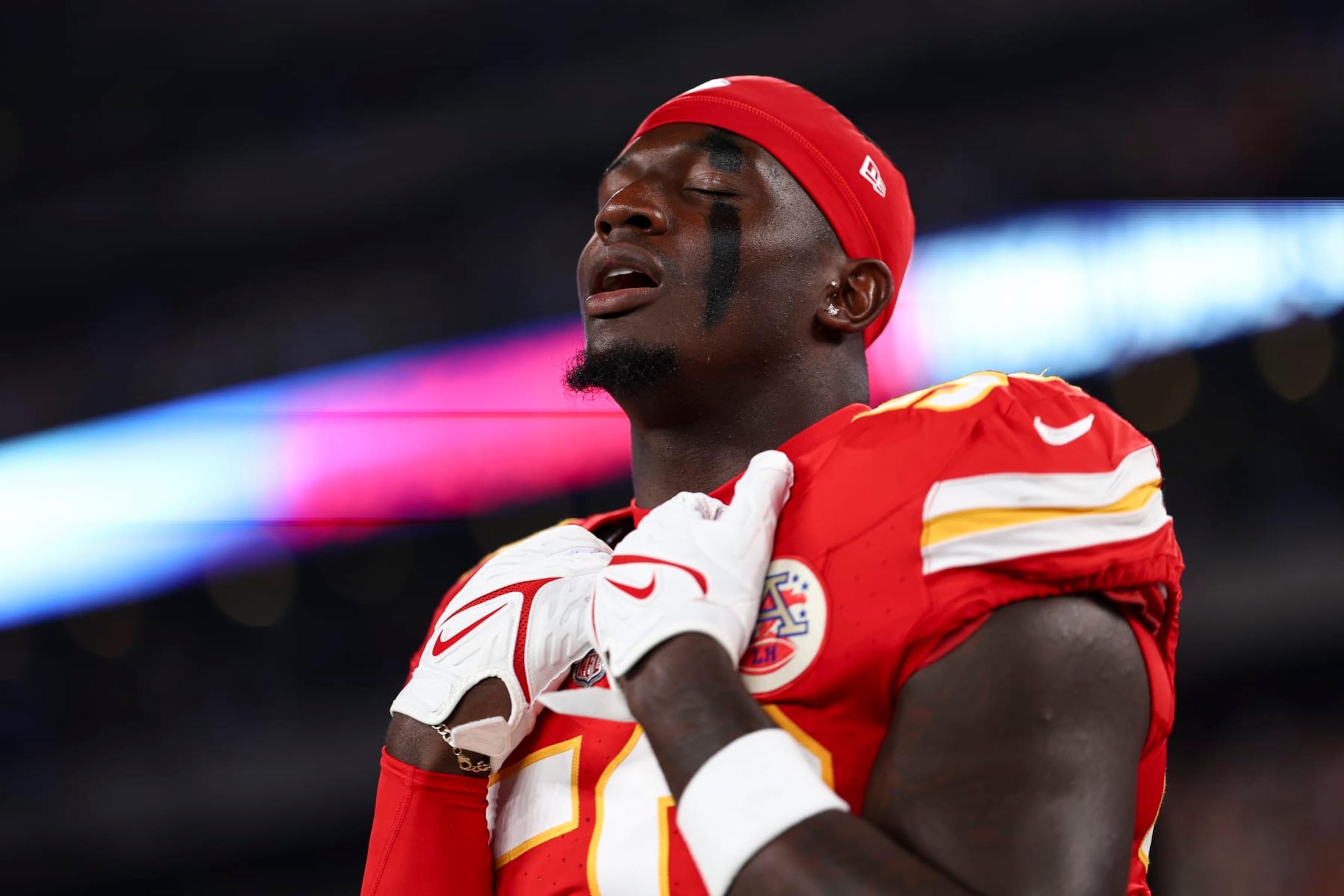 EAST RUTHERFORD, NJ - OCTOBER 1: Willie Gay #50 of the Kansas City Chiefs stands on the sidelines during the national anthem prior to an NFL football game against the New York Jets at MetLife Stadium on October 1, 2023 in East Rutherford, New Jersey. (Photo by Kevin Sabitus/Getty Images)