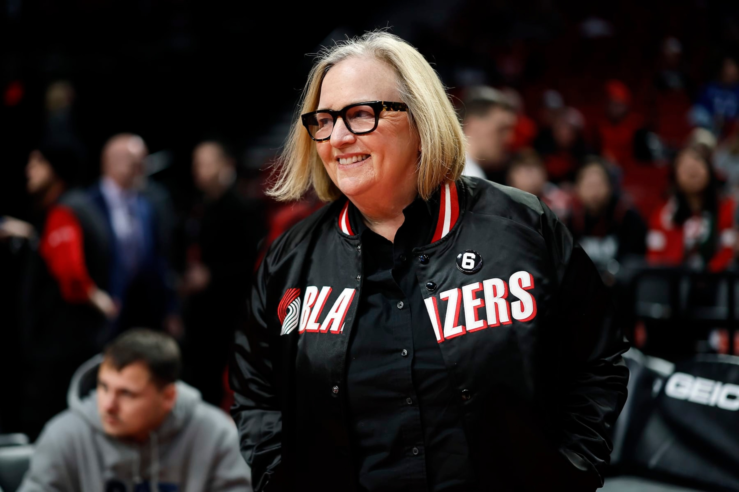 PORTLAND, OREGON - DECEMBER 04: Portland Trail Blazers owner Jody Allen smiles while walking on the court before the game against the Indiana Pacers at Moda Center on December 04, 2022 in Portland, Oregon. NOTE TO USER: User expressly acknowledges and agrees that, by downloading and or using this photograph, User is consenting to the terms and conditions of the Getty Images License Agreement. (Photo by Soobum Im/Getty Images)