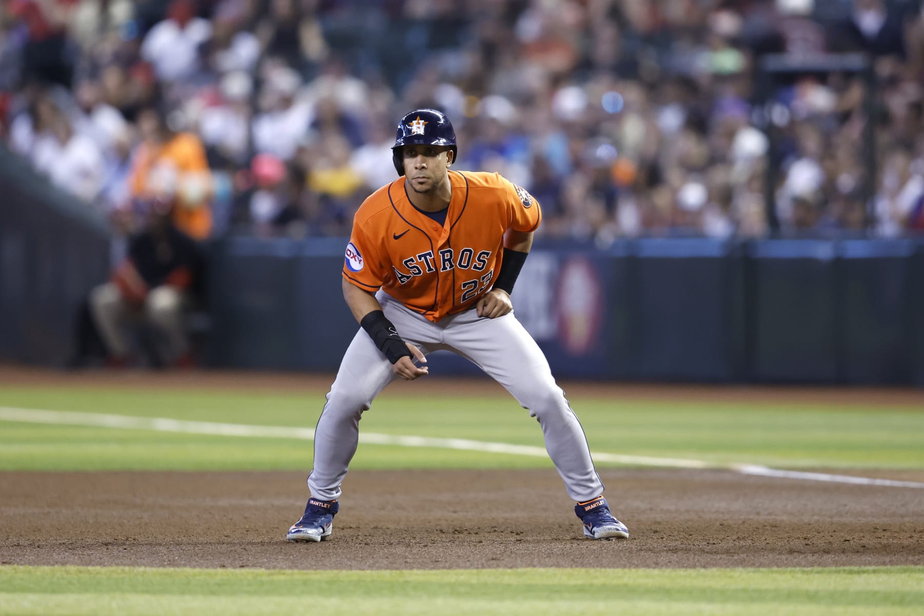 PHOENIX, ARIZONA - OCTOBER 01: Michael Brantley #23 of the Houston Astros leads off first base during the game against the Arizona Diamondbacks at Chase Field on October 01, 2023 in Phoenix, Arizona. The Astros defeated the Diamondbacks 8-1. (Photo by Chris Coduto/Getty Images)