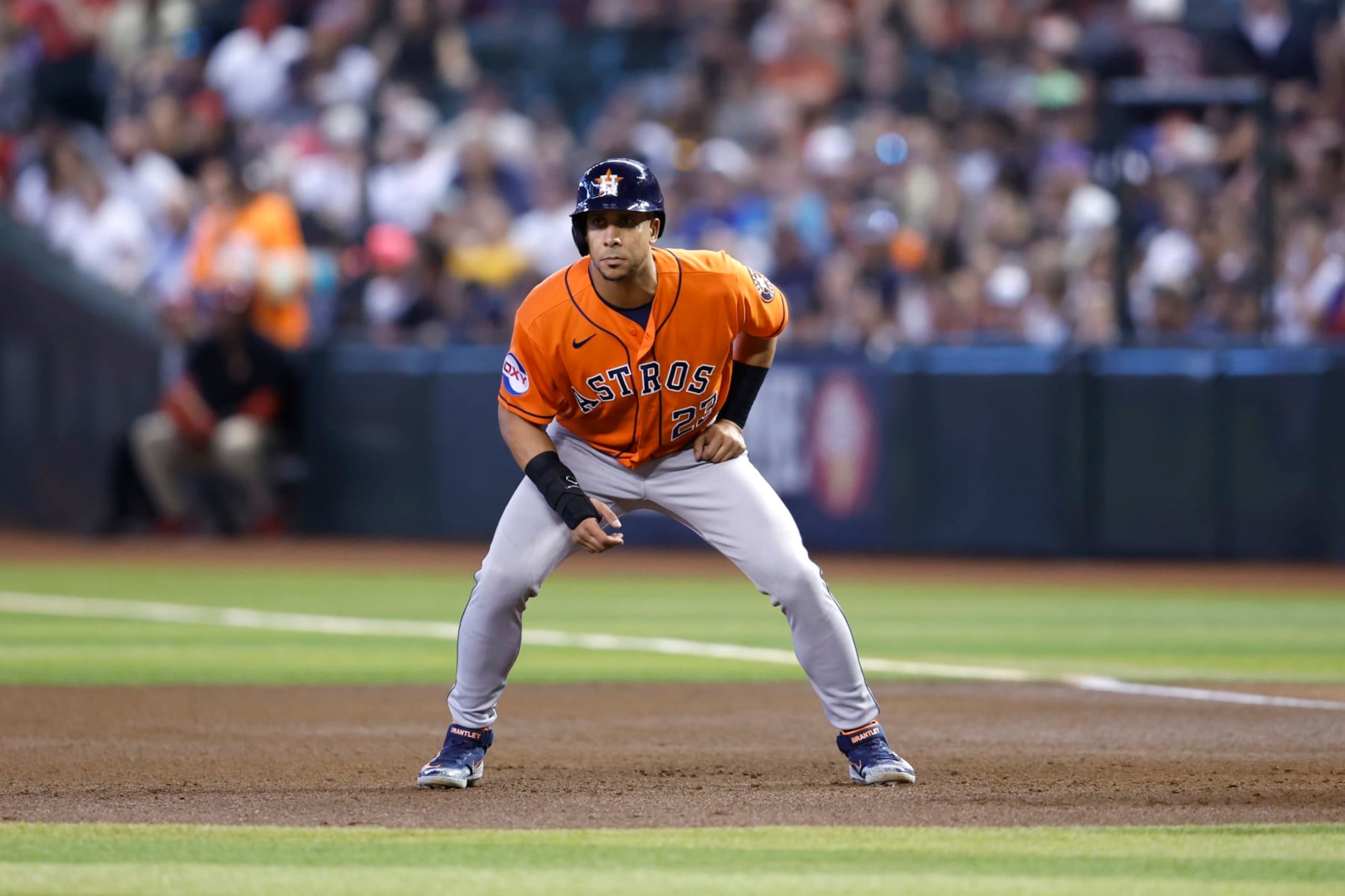 PHOENIX, ARIZONA - OCTOBER 01: Michael Brantley #23 of the Houston Astros leads off first base during the game against the Arizona Diamondbacks at Chase Field on October 01, 2023 in Phoenix, Arizona. The Astros defeated the Diamondbacks 8-1. (Photo by Chris Coduto/Getty Images)