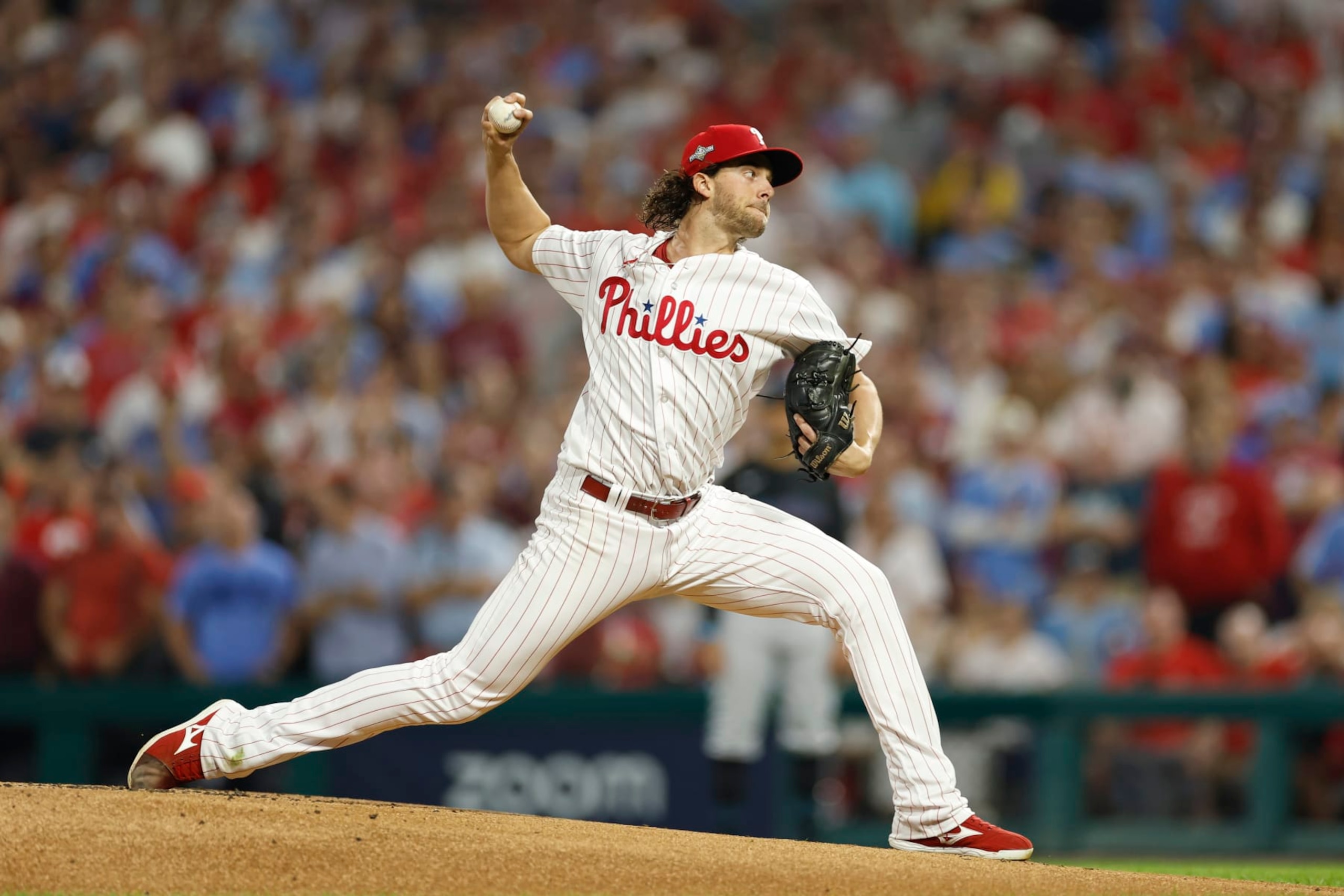PHILADELPHIA, PENNSYLVANIA - OCTOBER 04: Aaron Nola #27 of the Philadelphia Phillies pitches during the first inning against the Miami Marlins in Game Two of the Wild Card Series at Citizens Bank Park on October 04, 2023 in Philadelphia, Pennsylvania. (Photo by Sarah Stier/Getty Images)