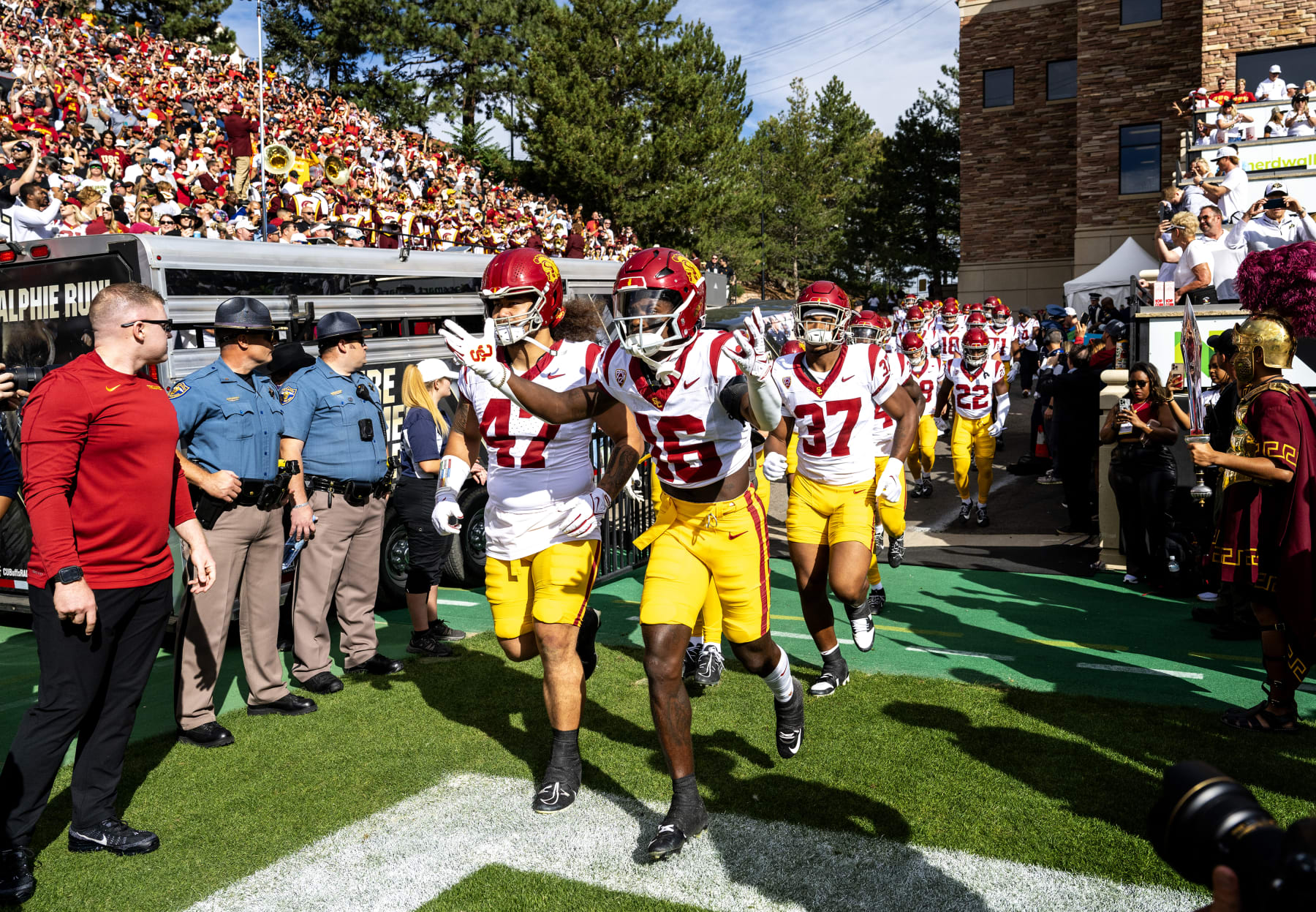 BOULDER, CO - SEPTEMBER 30, 2023: USC Trojans wide receiver Tahj Washington (16)  leads the team onto the field against Colorado at Folsom Field  at the University of Colorado on September 30, 2023 in Boulder, Colorado.(Gina Ferazzi / Los Angeles Times via Getty Images)