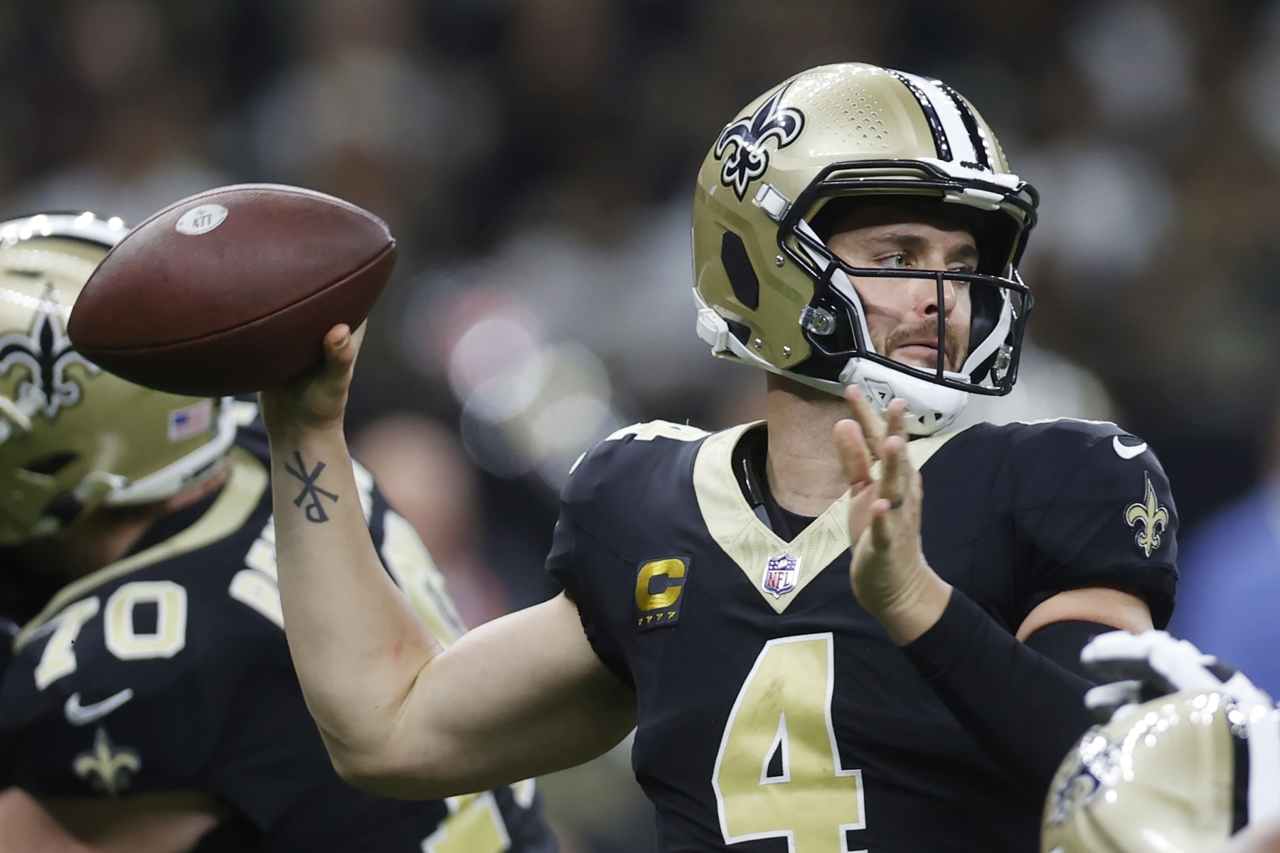 NEW ORLEANS, LOUISIANA - OCTOBER 01: Derek Carr #4 of the New Orleans Saints attempts a pass during the first half against the Tampa Bay Buccaneers at Caesars Superdome on October 01, 2023 in New Orleans, Louisiana. (Photo by Chris Graythen/Getty Images)