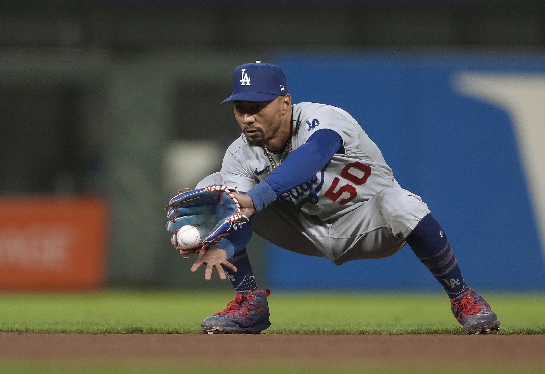 SAN FRANCISCO, CALIFORNIA - SEPTEMBER 29: Mookie Betts #50 of the Los Angeles Dodgers goes down to catch a line drive hit by LaMonte Wade Jr. #31 of the San Francisco Giants in the bottom of the eighth inning at Oracle Park on September 29, 2023 in San Francisco, California. (Photo by Thearon W. Henderson/Getty Images)
