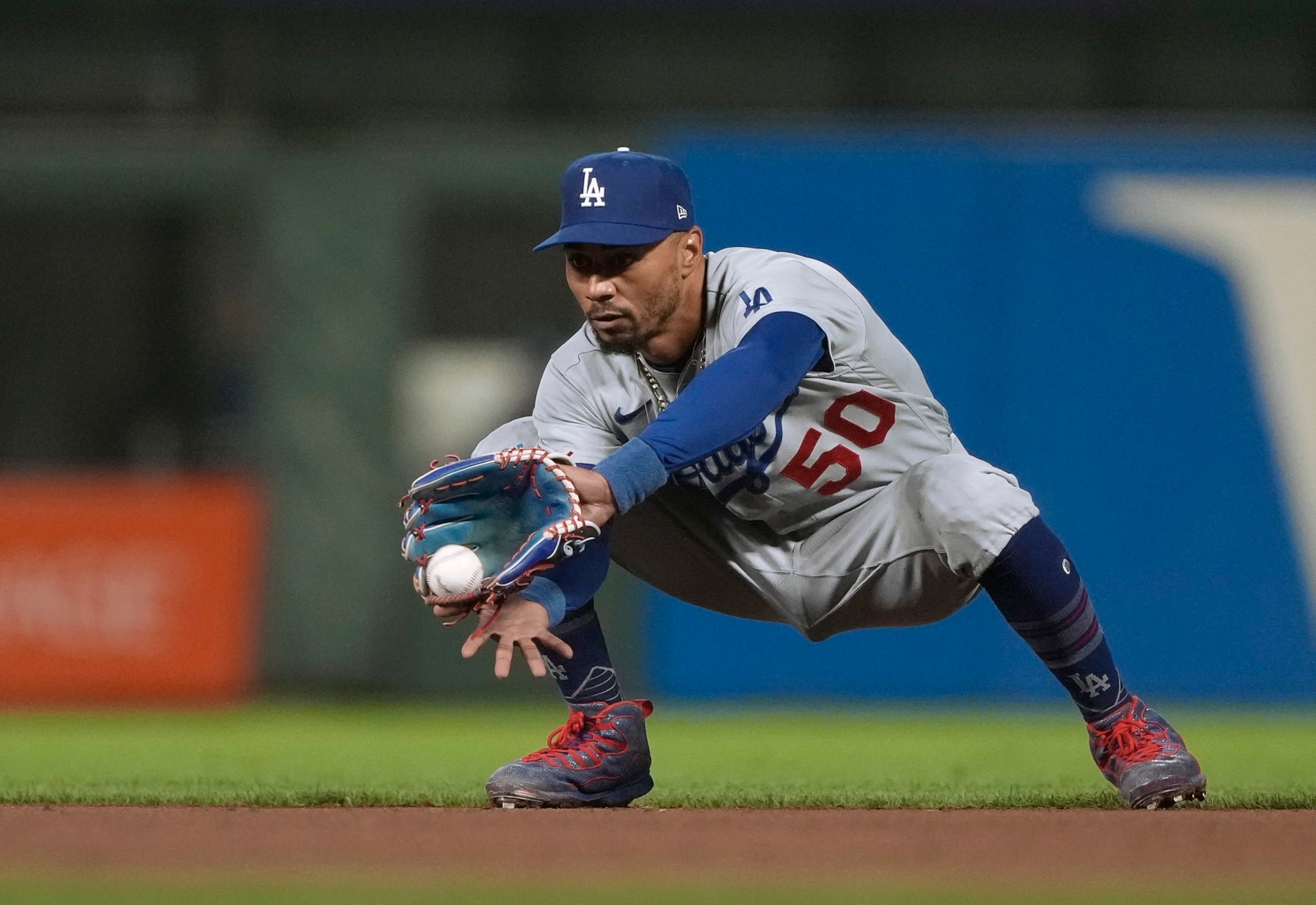 SAN FRANCISCO, CALIFORNIA - SEPTEMBER 29: Mookie Betts #50 of the Los Angeles Dodgers goes down to catch a line drive hit by LaMonte Wade Jr. #31 of the San Francisco Giants in the bottom of the eighth inning at Oracle Park on September 29, 2023 in San Francisco, California. (Photo by Thearon W. Henderson/Getty Images) SAN FRANCISCO, CALIFORNIA - SEPTEMBER 29: Mookie Betts #50 of the Los Angeles Dodgers goes down to catch a line drive hit by LaMonte Wade Jr. #31 of the San Francisco Giants in the bottom of the eighth inning at Oracle Park on September 29, 2023 in San Francisco, California. (Photo by Thearon W. Henderson/Getty Images)