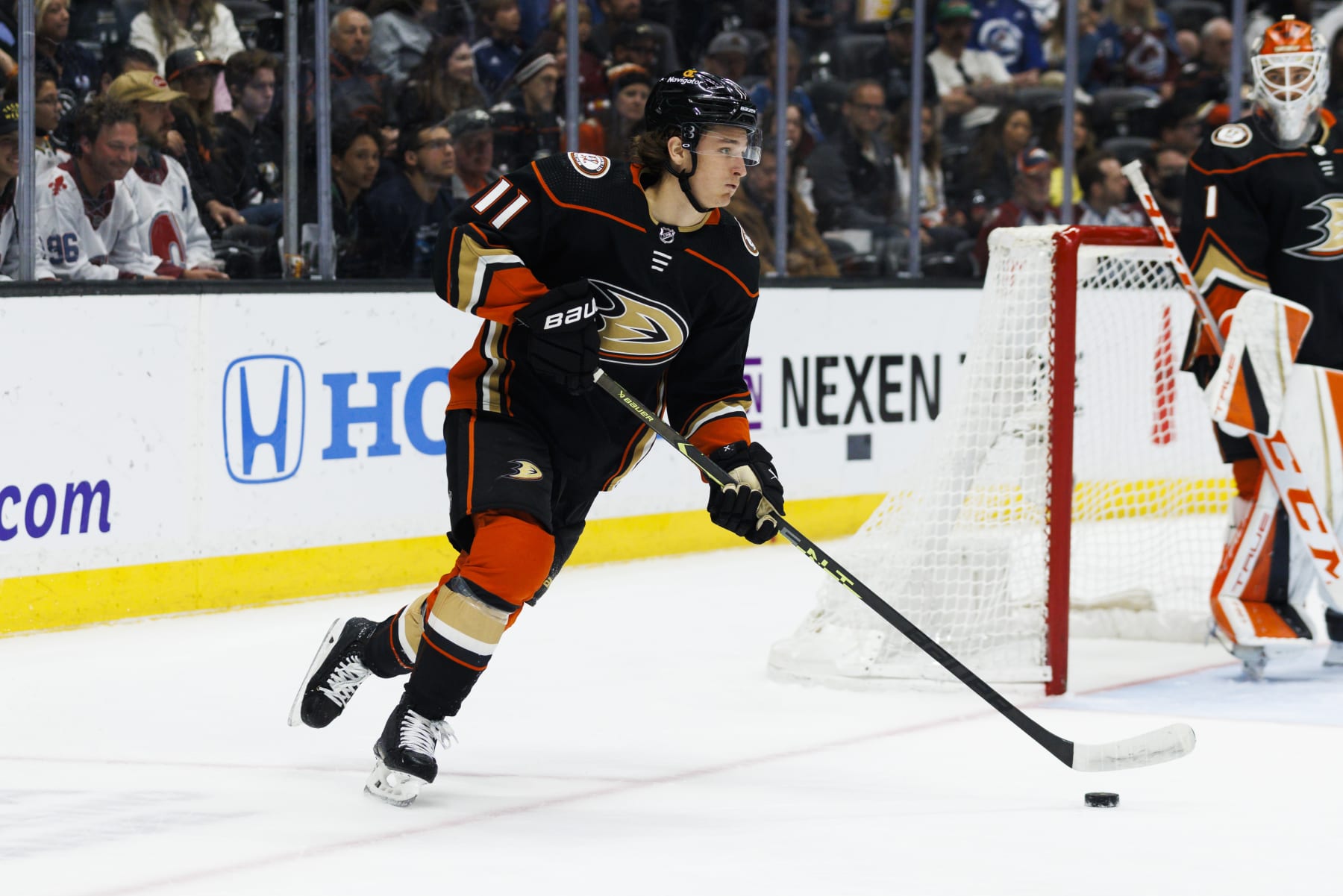 ANAHEIM, CA - APRIL 09: Anaheim Ducks center Trevor Zegras (11) skates with the puck during an NHL hockey game between the Colorado Avalanche and the Anaheim Ducks on April 9, 2023 at Honda Center in Anaheim, CA. (Photo by Ric Tapia/Icon Sportswire via Getty Images)