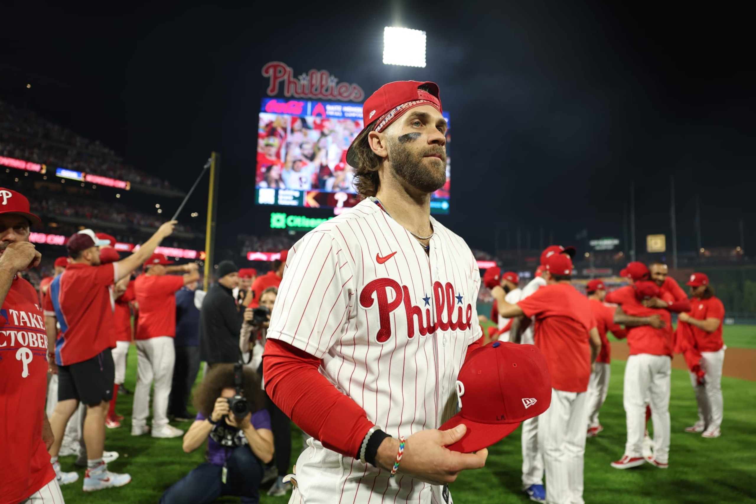 PHILADELPHIA, PENNSYLVANIA - OCTOBER 04: Bryce Harper #3 of the Philadelphia Phillies celebrates after defeating the Miami Marlins 7-1 in Game Two of the Wild Card Series at Citizens Bank Park on October 04, 2023 in Philadelphia, Pennsylvania. (Photo by Tim Nwachukwu/Getty Images)