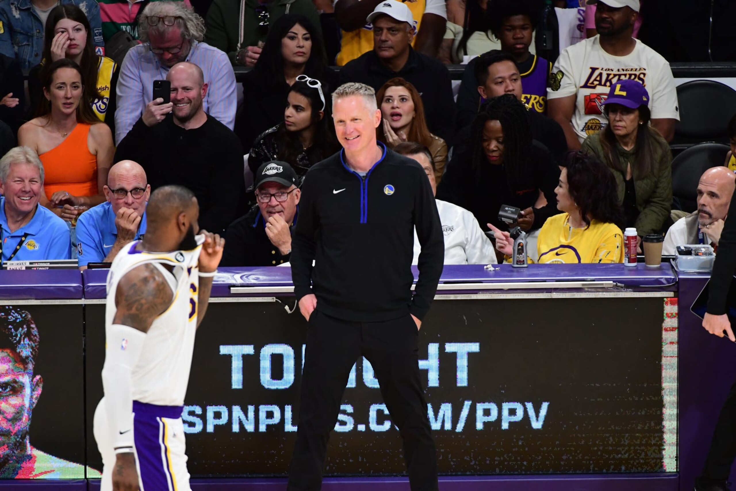 LOS ANGELES, CA - MAY 6: LeBron James #6 of the Los Angeles Lakers talks with Head Coach Steve Kerr of the Golden State Warriors during Game Three of the Western Conference Semi-Finals of the 2023 NBA Playoffs on May 6, 2023 at Crypto.Com Arena in Los Angeles, California. NOTE TO USER: User expressly acknowledges and agrees that, by downloading and/or using this Photograph, user is consenting to the terms and conditions of the Getty Images License Agreement. Mandatory Copyright Notice: Copyright 2023 NBAE (Photo by Adam Pantozzi/NBAE via Getty Images)